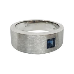 Asymmetrically Set Solitaire Sapphire White Gold Ring