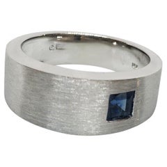 Asymmetrically Set Solitaire Sapphire White Gold Ring