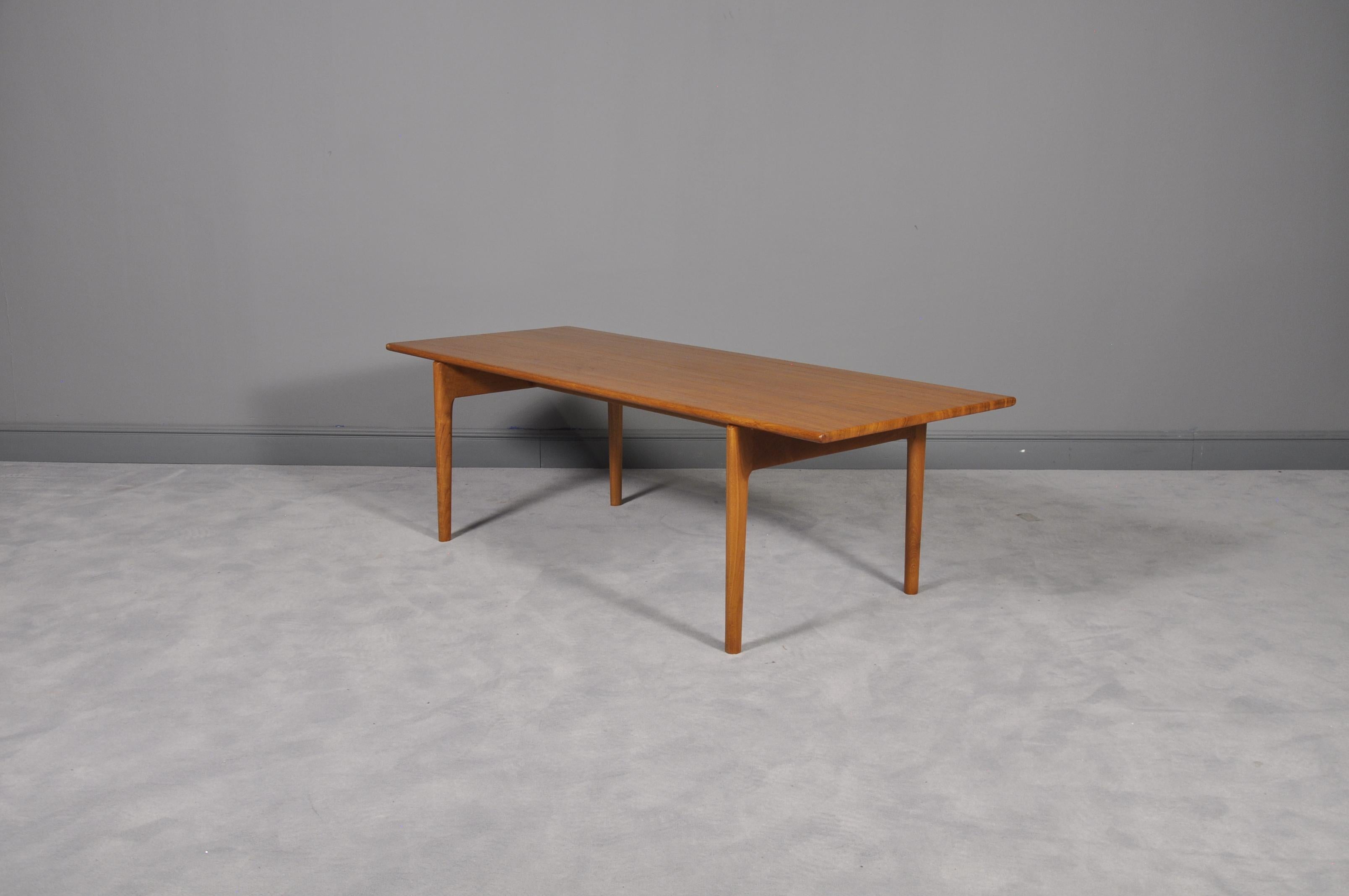 Beautiful Andreas Tuck midcentury coffee table features the wonderful design of Hans J. Wegner. Complete with trademark signed, and makers stamp this piece makes a great addition to home or business. Made of teak and in good condition with some wear
