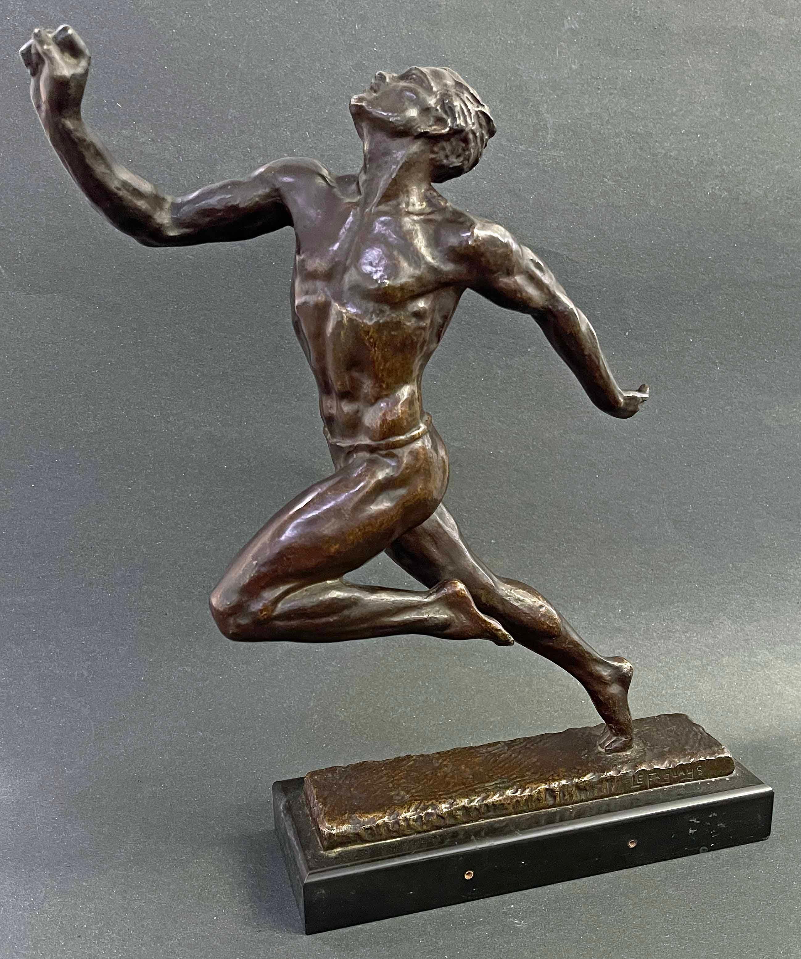 Beautifully cast and finished with a rich, brown patina, this extremely rare bronze by Pierre Le Faguays depicts a nude runner racing at top speed, his head thrown up in relief and exaltation as he crosses the finish line, his lithe limbs straining