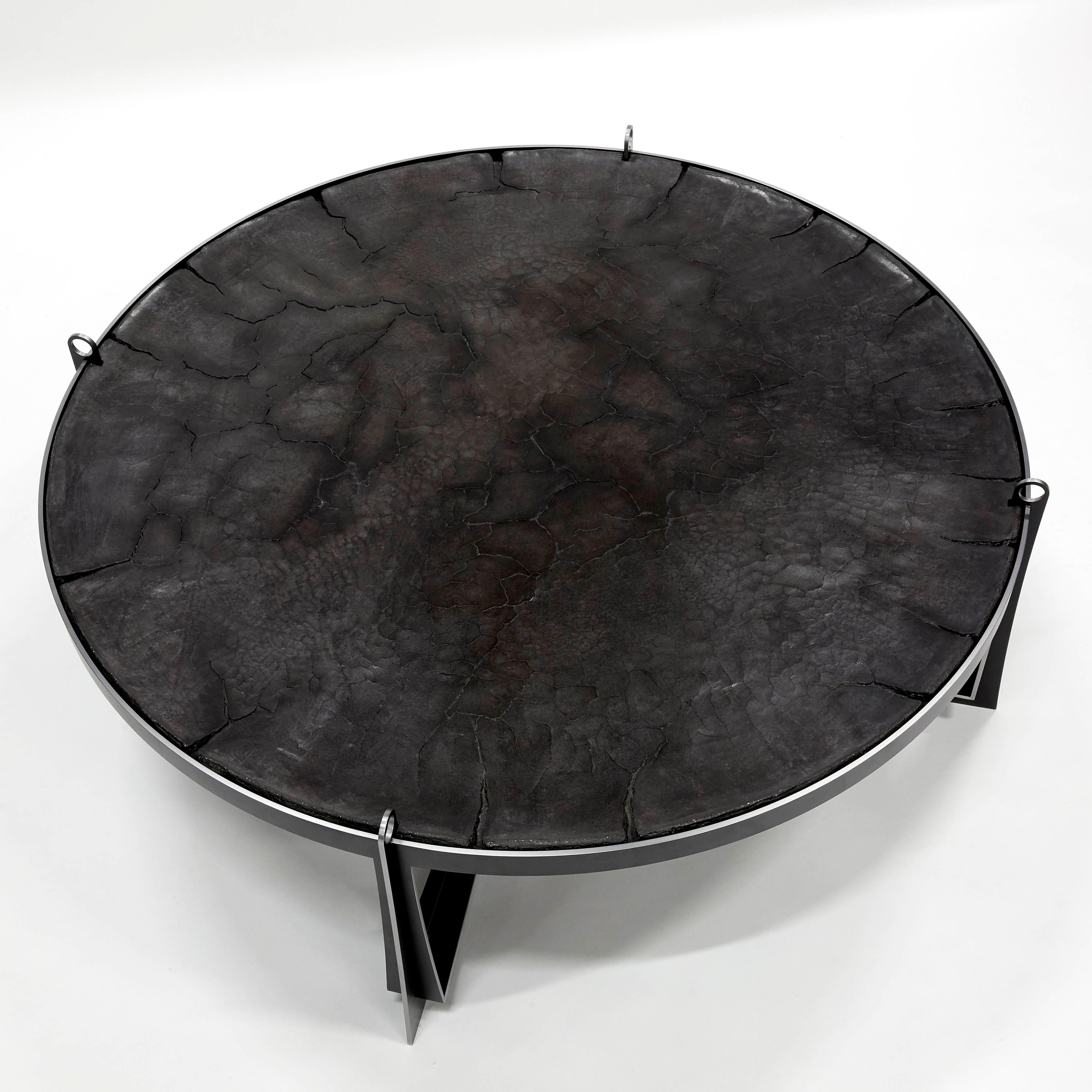 This unique piece of Erwan Boulloud, French artist represented by Galerie Negropontes in Paris, is made at the atelier of the artist. 
The table top is a print on concrete and waxed.

Erwan Boulloud is a graduate of the Ecole Boulle. He began by