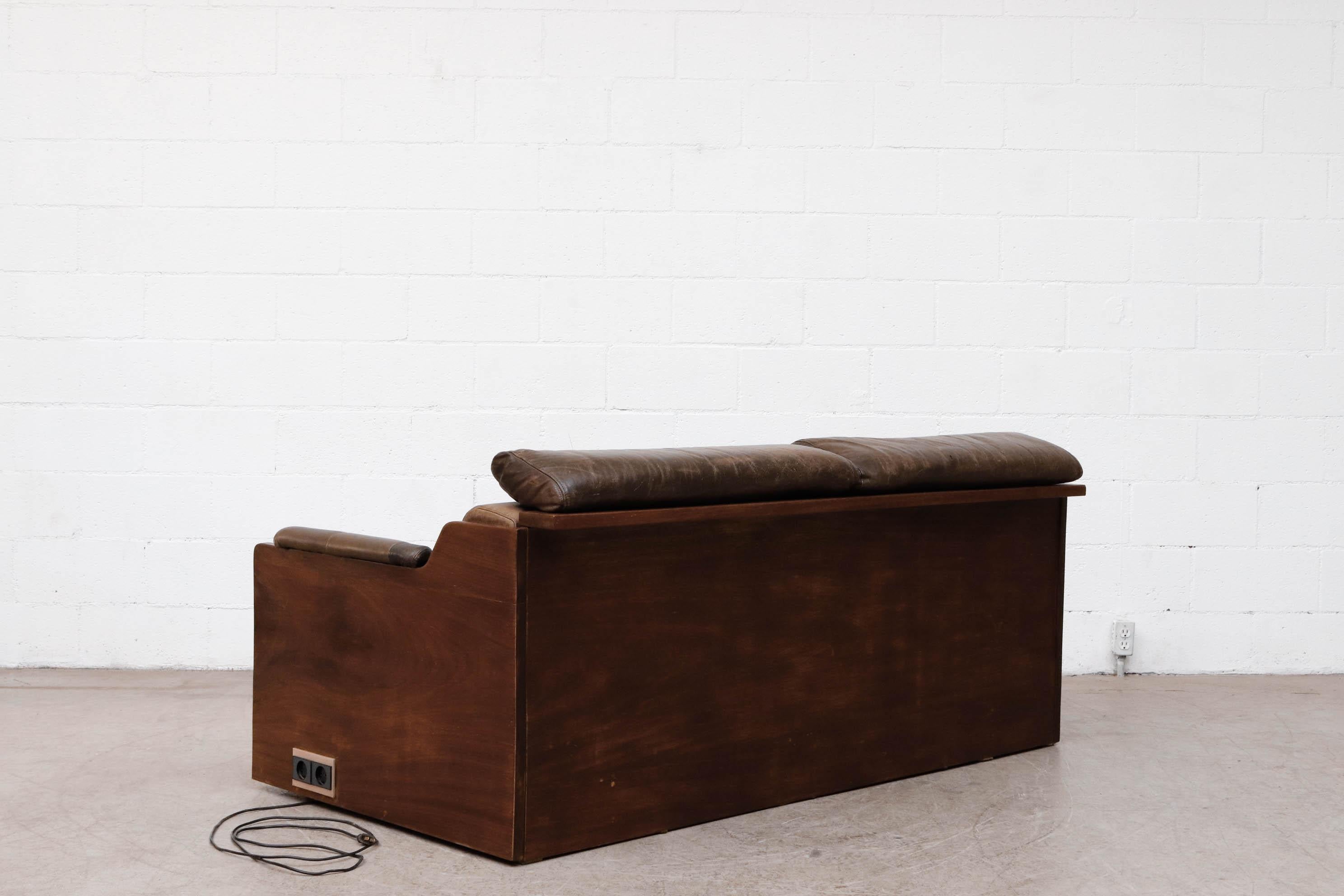 Late 20th Century Ate van Apeldoorn Custom Solid Iroko Loveseat with Brown Leather and Outlet For Sale