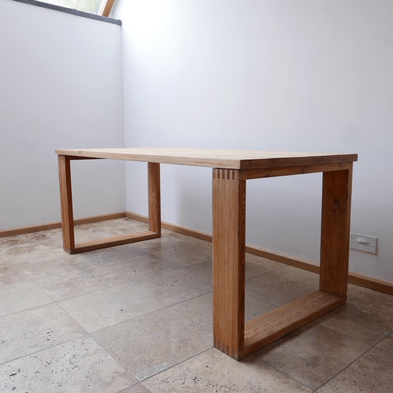 A Dutch mid-century dining table. 

By Ate Van Apeldoorn for Houtwerk Hattem.

Holland, c1970s. 

Stripped pine. 

Lovely exposed joints detailing. 

Dimensions: 180 W x 79 D x 73 H in cm. 

  