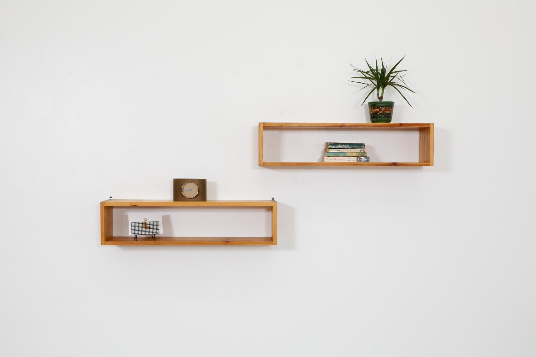 Beautiful, 1970's, Mid-century Ate van Apeldoorn designed floating pine wall mount shelf with well-crafted square box joints. In 1958, Dutchman Ate van Apeldoorn established his own wood furniture manufacturing company, the 
