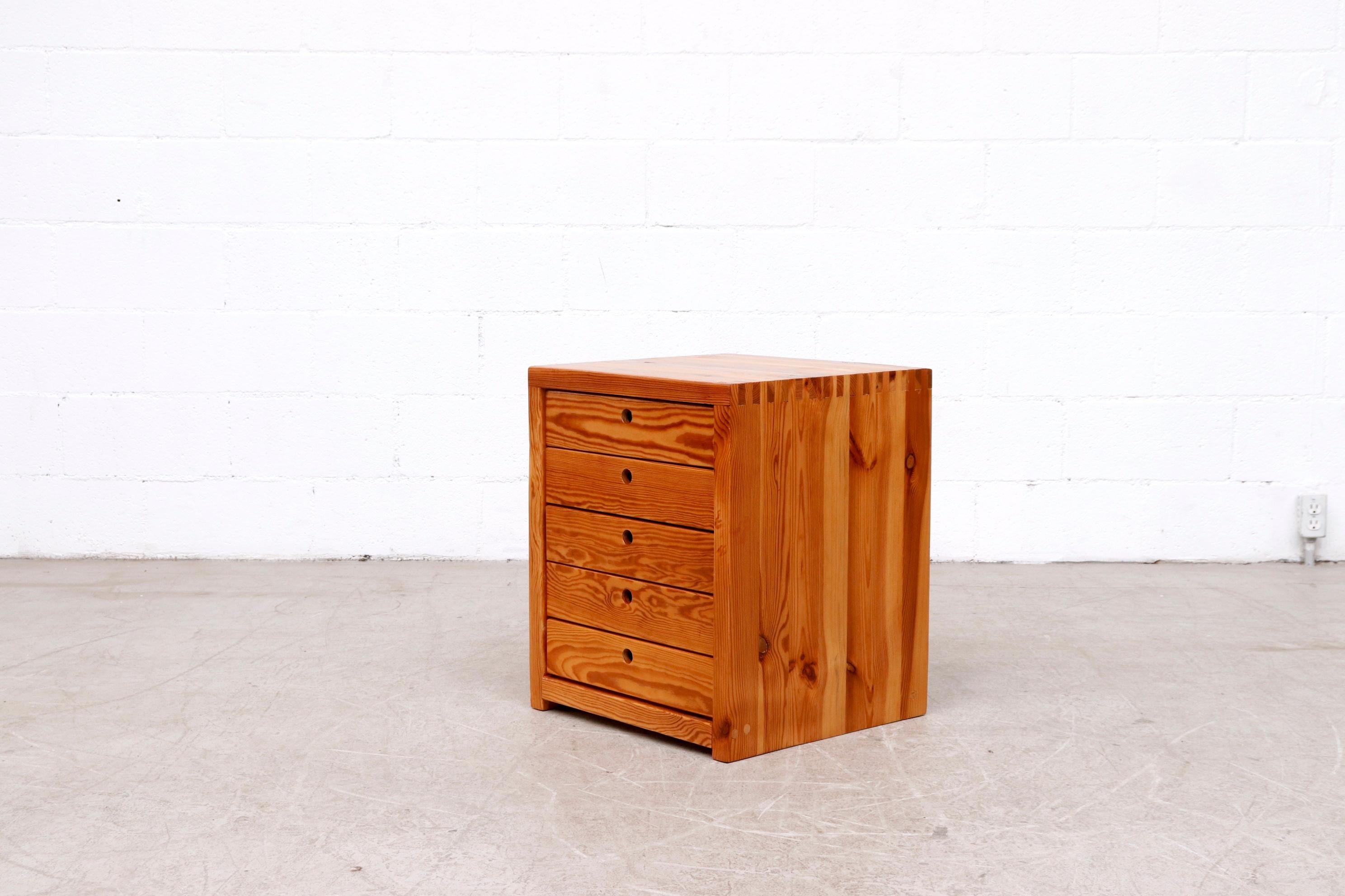 Beautiful Ate Van Apeldoorn small set of drawers or nightstand, lightly refinished pine. With cut-out pulls. In original condition with wear consistent with its age and use.
