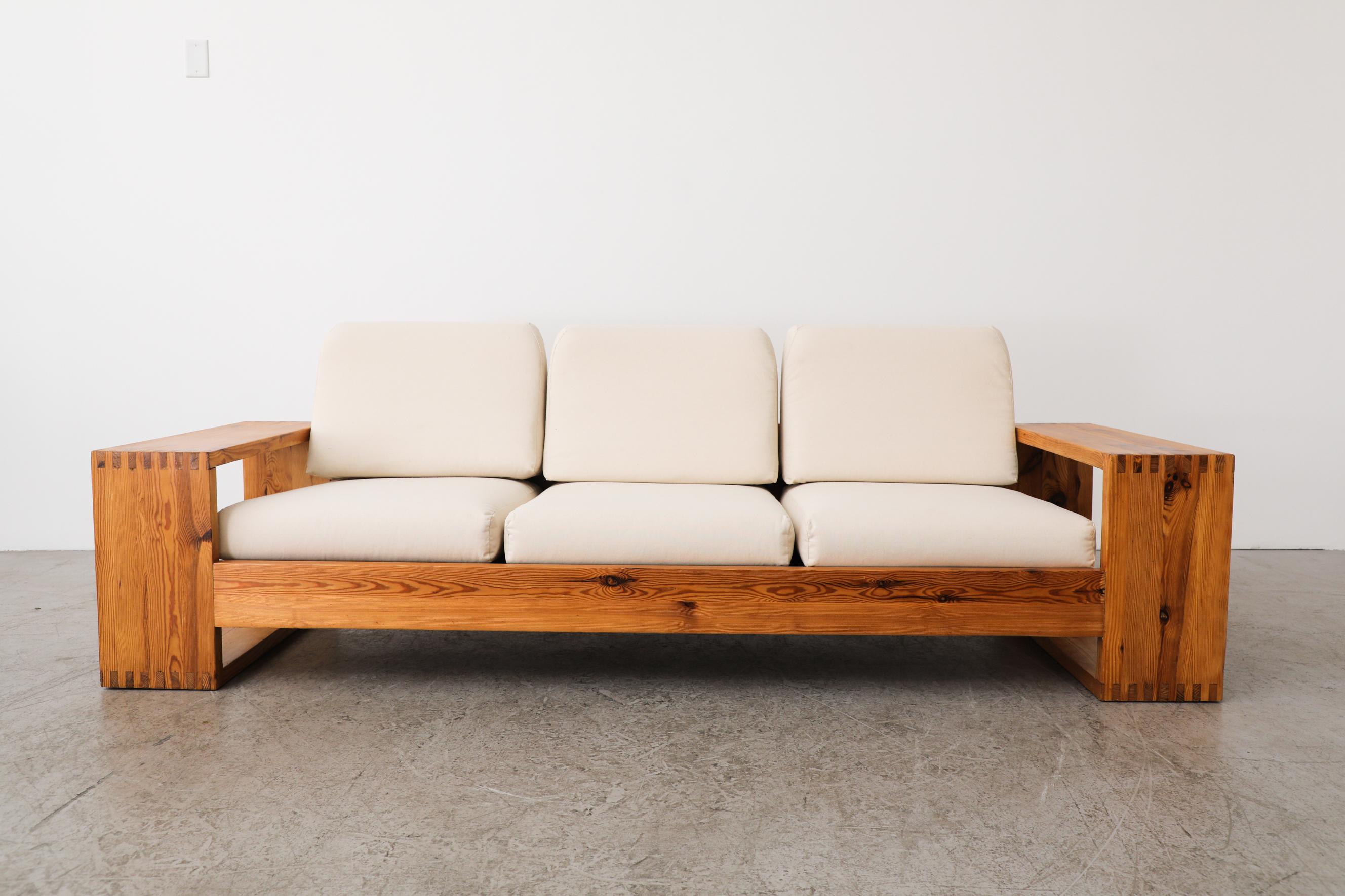 1980's Ate Van Apeldoorn 3 seater sofa with newly upholstered cushions in natural canvas. Frame is made from solid pine secured with box joints along the edges with an open square arm design. 3/8