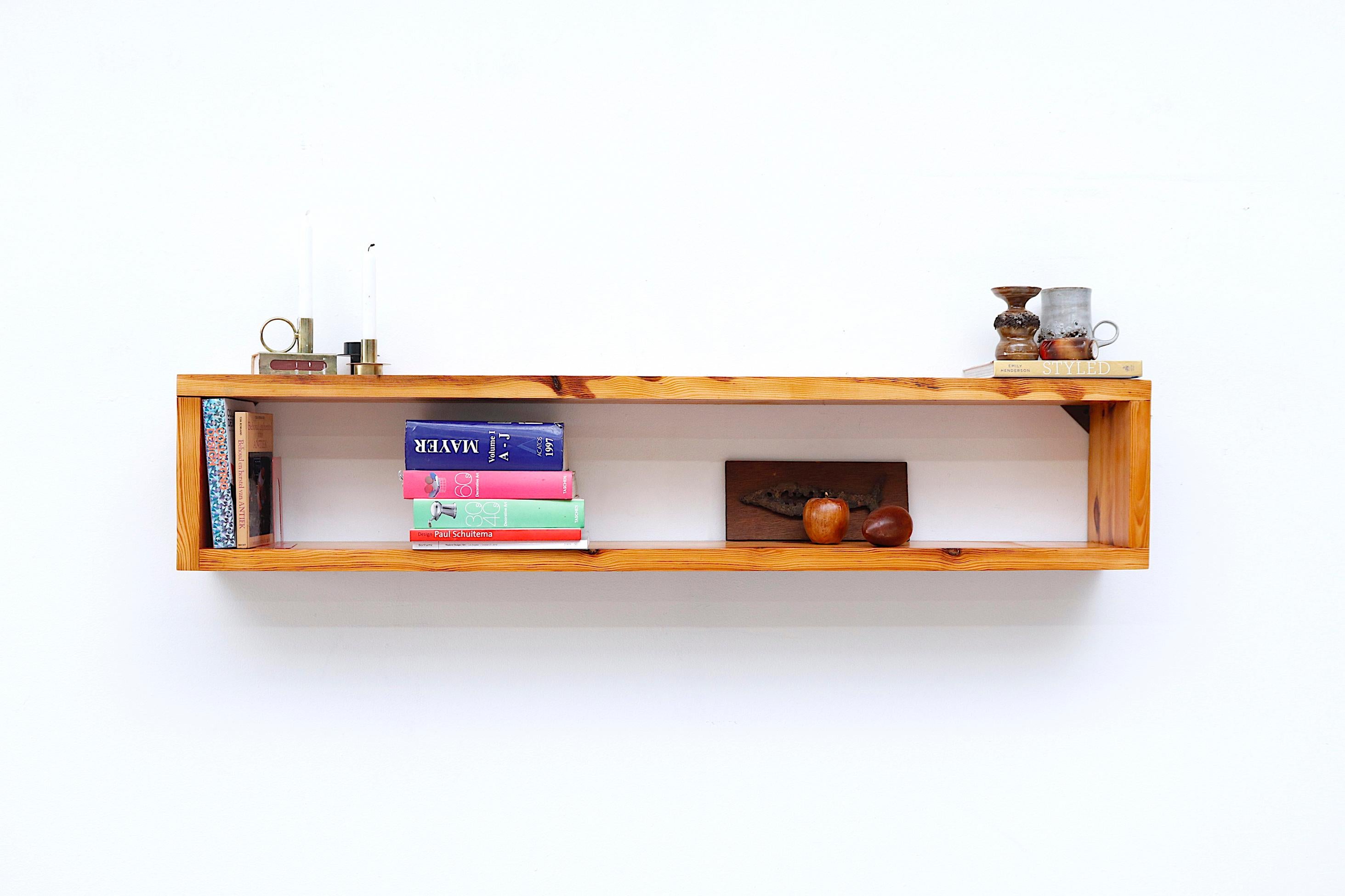 Impressive midcentury Ate Van Apeldoorn floating pine wall mount shelf. Lightly refinished, otherwise in original condition with some wear and light scratching consistent with age and use. The space between is 9
