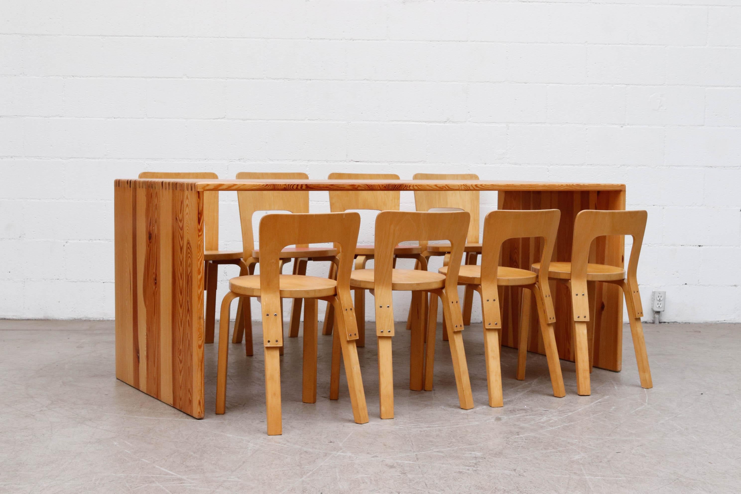 Minimalistic Ate Van Apeldoorn pine waterfall dining table or desk with box joints. Beautiful wood grain, lightly refinished in otherwise original condition with normal wear. Shot with Alvar Aalto dining chairs for Artek (LU922422393312 and