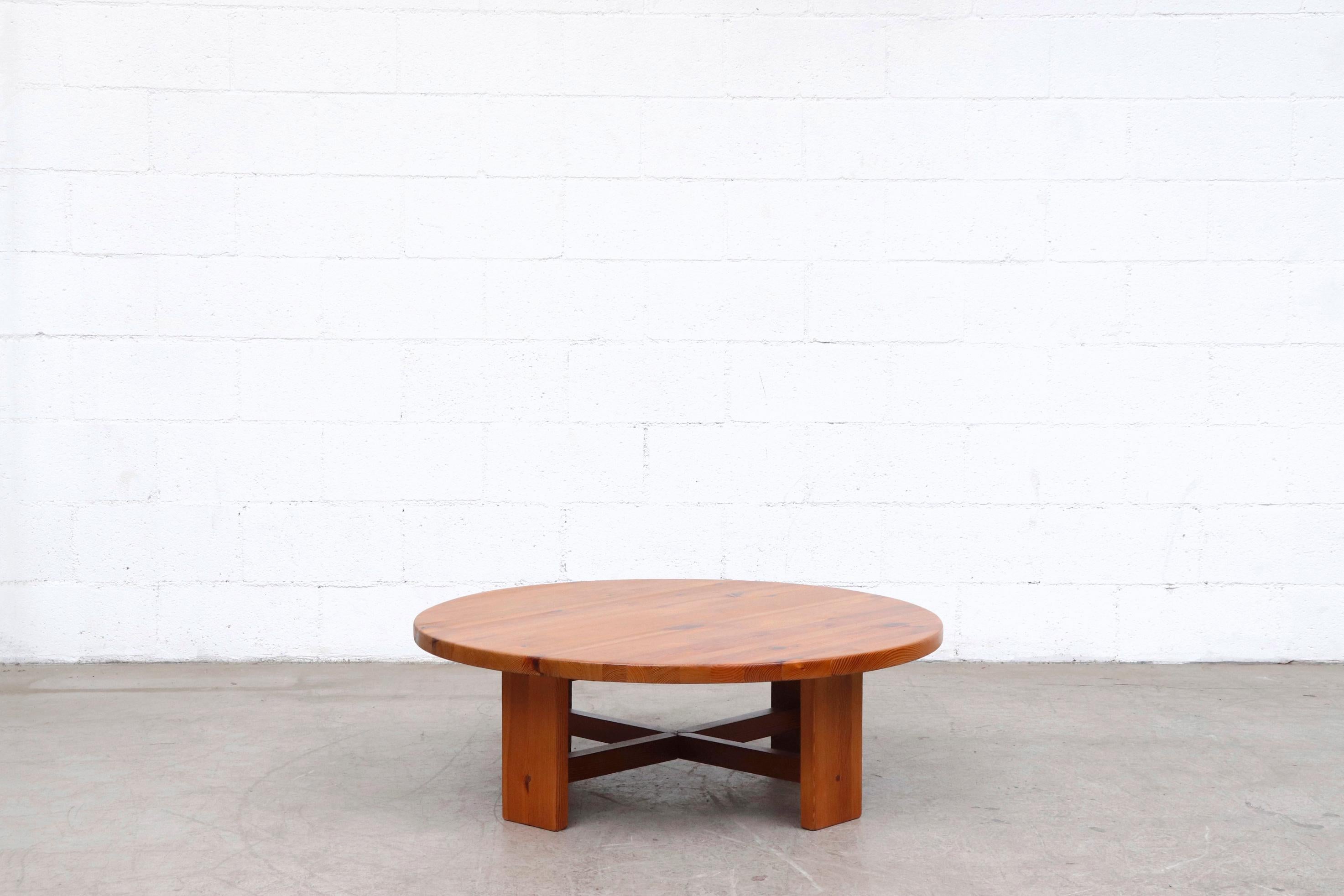 Midcentury Ate Van Apeldoorn round pine coffee table lightly refinished with some visible wear and scratching consistent with age and use. Handsome blocky design.