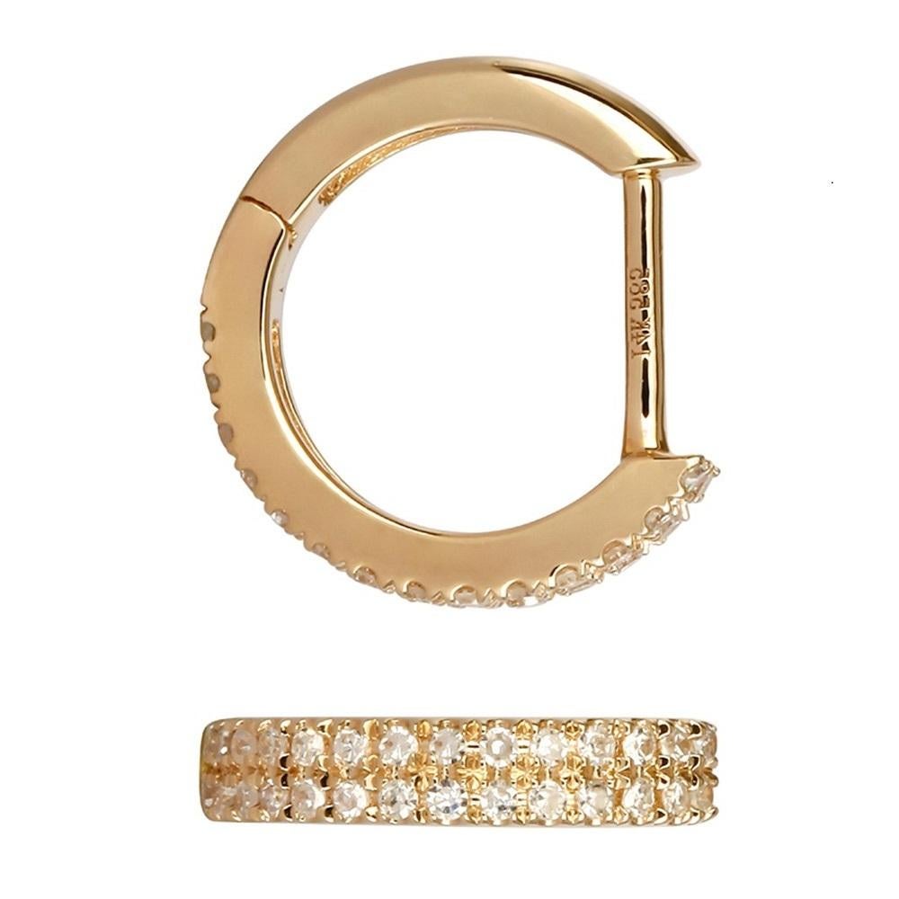 14K yellow gold micro huggie hoops with two rows of real white diamond pavé

Do you need a huggie? Start collecting our must-have 14K Gold and Diamond Micro Huggie Hoops now and build your ear story!

Specifications:
- Color: Yellow Gold
- Metal: