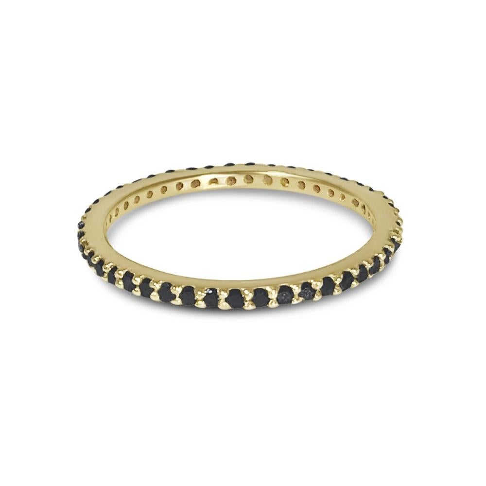 Black diamond attitude wrapped around your finger in our new 14K gold and pavé eternity band

Calling that black diamond attitude! Our black diamond pavé eternity band is a glimmering addition to any look, warmed up by our 14K yellow gold