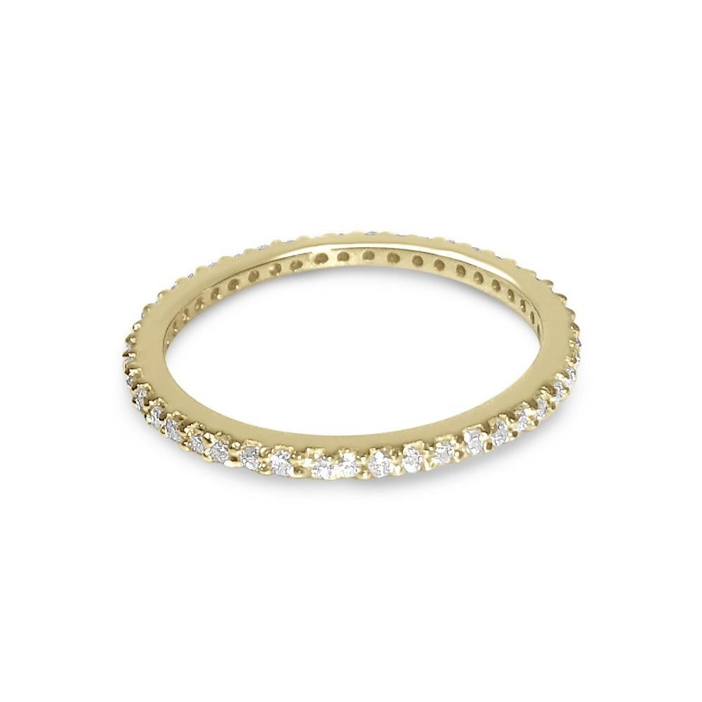 Your essential everyday diamonds wrapped around your finger in our new 14K gold and pavé eternity band

Our white diamond pavé eternity band is a glimmering addition to any look, warmed up by our 14K yellow gold setting.

Specifications:
- Color: