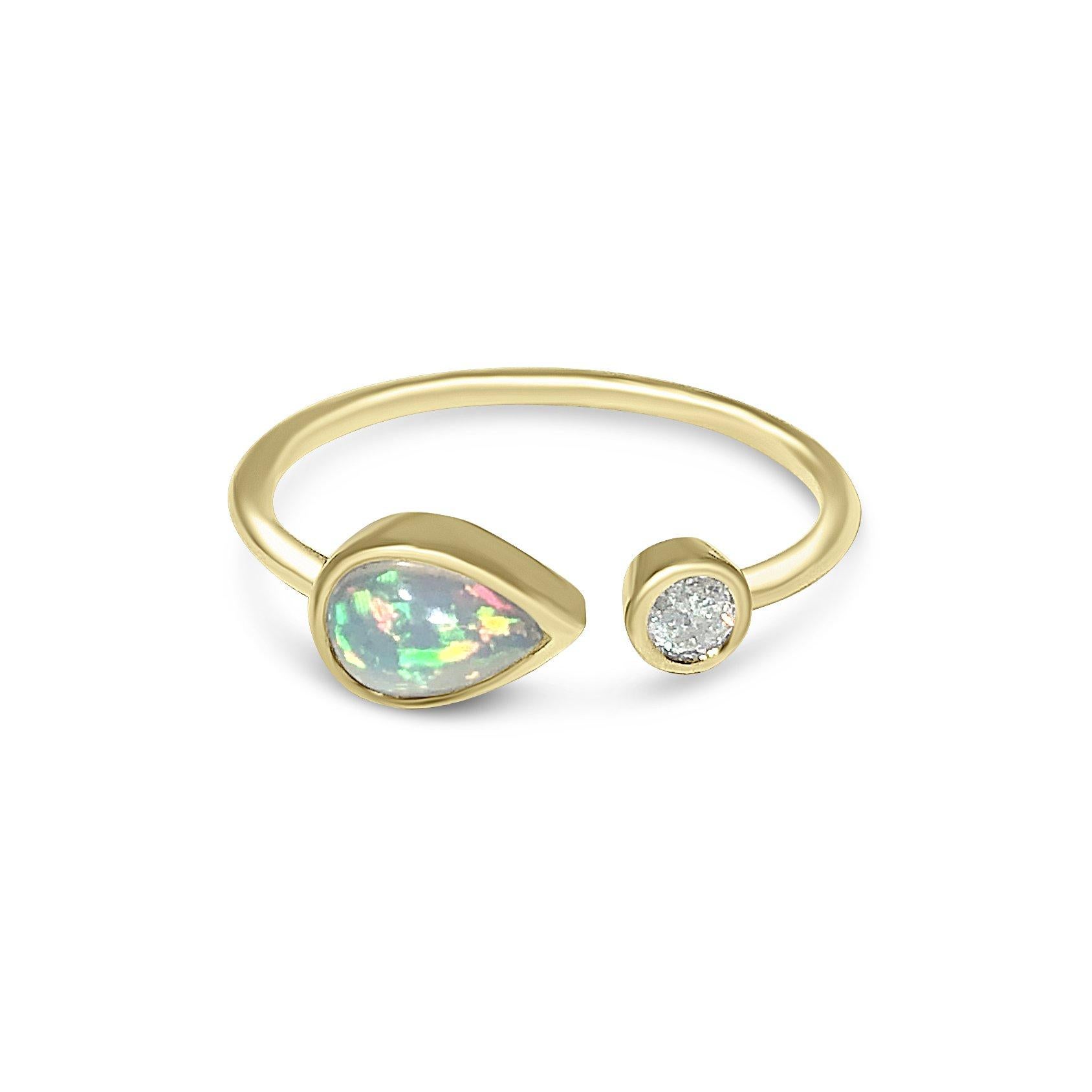 Shop our 14K gold, teardrop-shaped opal and bezel-set diamond ring

Specifications:
- Color: Yellow Gold
- Metal: 14K gold
- Stone: Opal, Diamond
- Stone Weight: Opal-0.65CT, Diamond-0.07ct
- Stone Size: Opal-6mm, Diamond-2mm
- Ring Size: