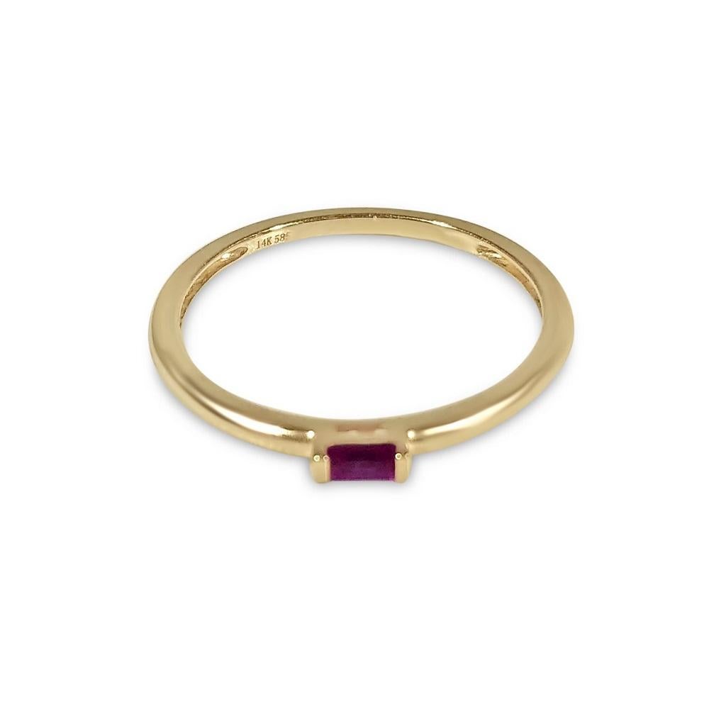Shop our delicate 14K pinky ring with a simple and clean baguette-cut gemstone

The perfect pinky ring! Set in 14K yellow gold with a fantastic ruby baguette. Can be worn as a midi ring as well!

Specifications:
- Gold Color: Yellow Gold
- Material: