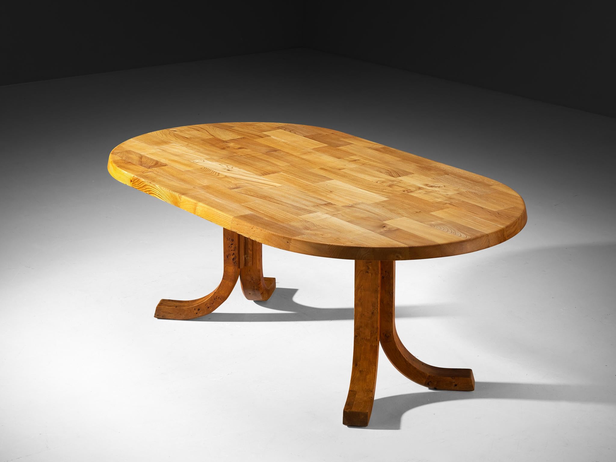 Atelier C. Demoyen, dining table, solid elm, France, 1970s

This dining table is a remarkable example of the refined craftsmanship that defines Atelier C. Demoyen's work. Made from solid elmwood, it combines sleek, contemporary design with a rustic,