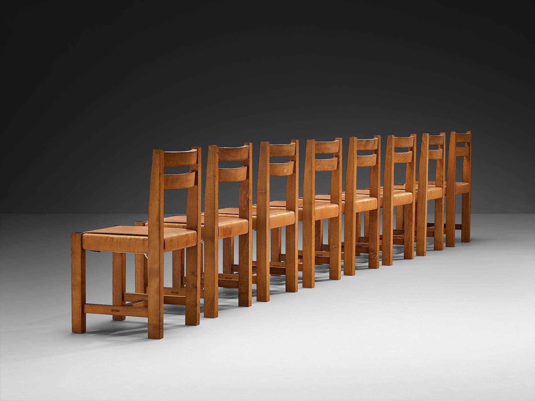 French Atelier C. Demoyen Set of Eight Dining Chairs in Elm and Cognac Leather For Sale