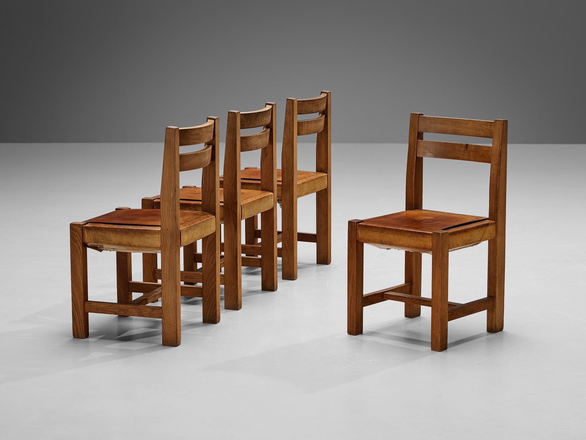 Atelier C. Demoyen, set of four dining chairs, elm, leather, rope, brass, France, 1970s

Atelier C. Demoyen (Claude de Moyen) gained prominence as a workshop recognized for crafting, among others, Pierre Chapo's designs. Consequently, their own