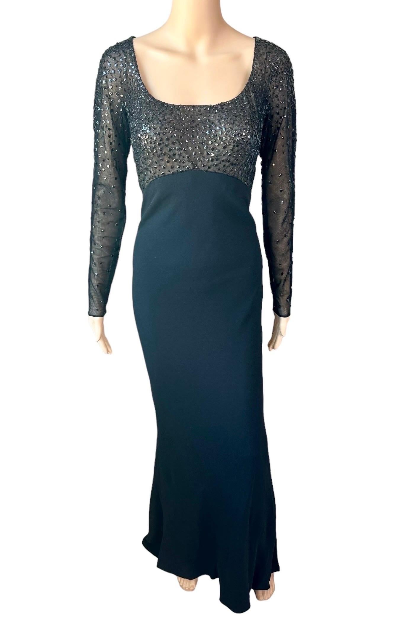 Atelier Gianni Versace Haute Couture F/W 1996 Custom Made Embellished Sheer Black Evening Dress Gown 

Condition: Good vintage condition, size and fabric tags removed, many embellishment are faded and some embellishments are chipped but it is not