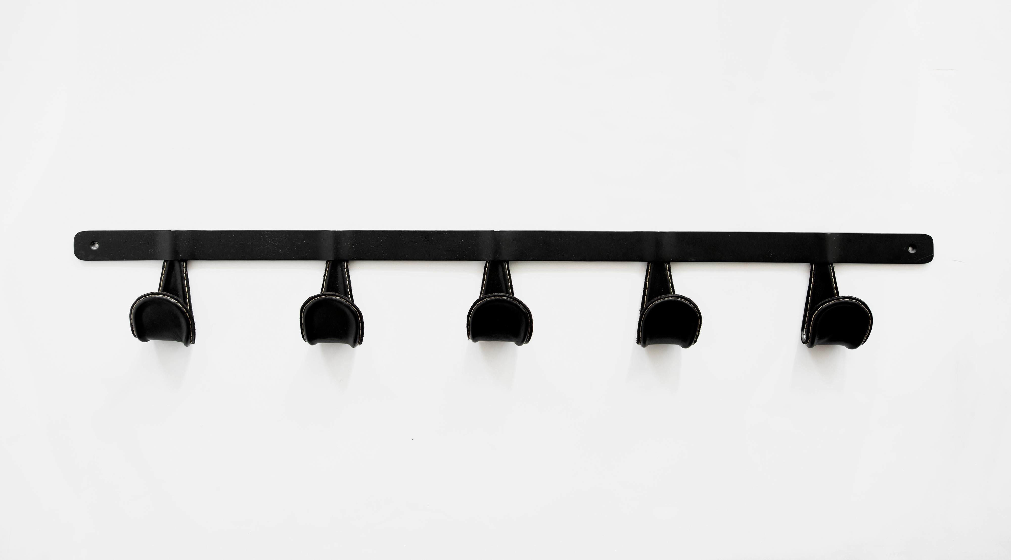 Newly produced iron and leather coat rack. Iron hooks wrapped in black leather with contrast stitching. Leather options available.