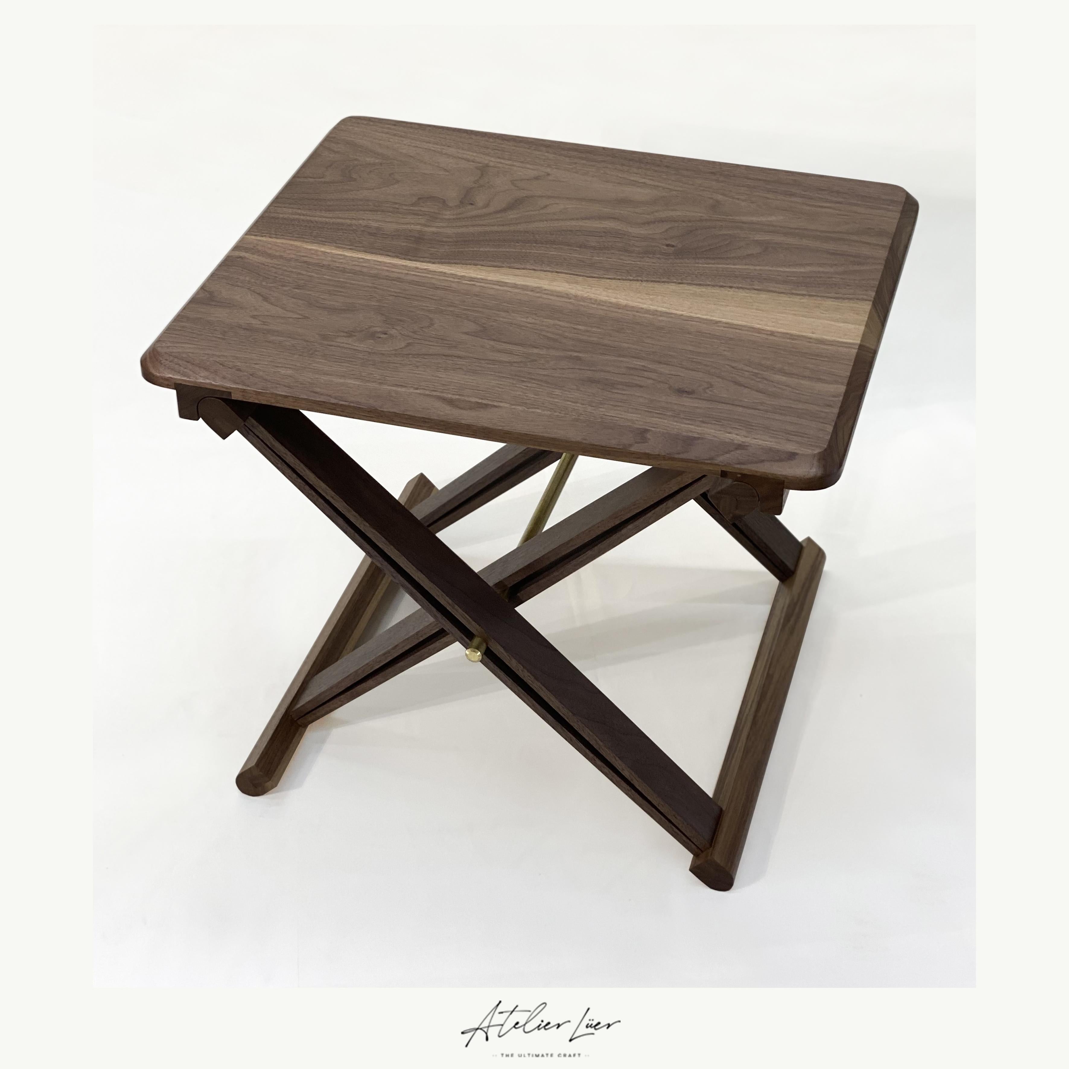 Atelier Luer Campaign Style Tray/Side Table with X-Frame Base and Leather Straps

Offered for sale is an Atelier Luer campaign style low tray/side table with and x-frame base secured with leather straps.  This table is custom made in our Seattle, WA