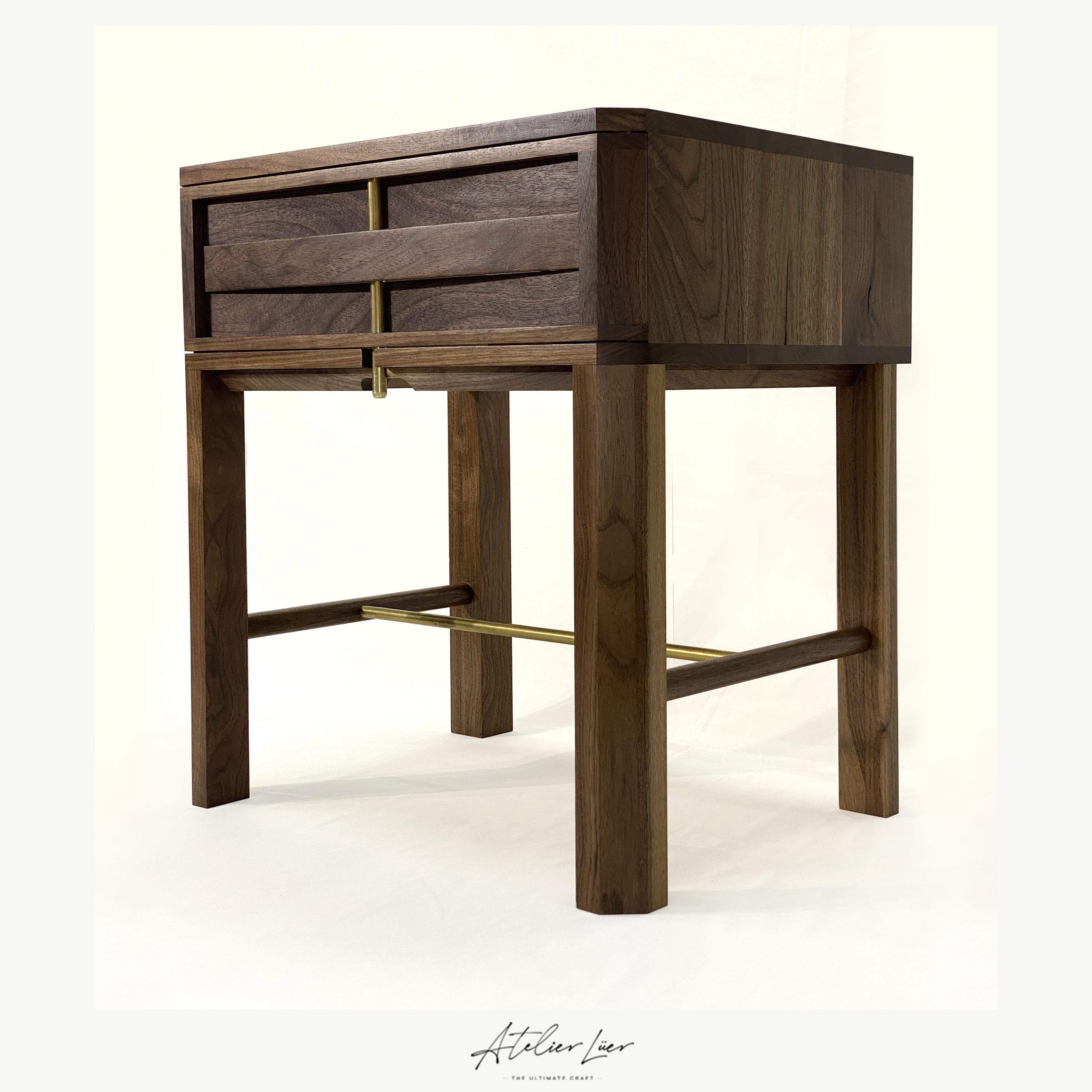 Atelier Luer Walnut Slat Front night/side/end table with drawer & brass hardware

Offered for sale is an American craftsman studio piece walnut slat front night/side/end table with a woven slat drawer and brass hardware. This piece is custom made