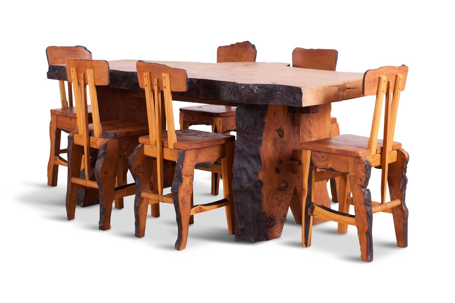 Unique dining suite in French elm (extinct)
matching table and chairs custom designed in an Atelier Français in the 1960s
Artisanal character gives a very personal feel and soul to your interior.
An ideal set for an eclectic interior.
Measures: