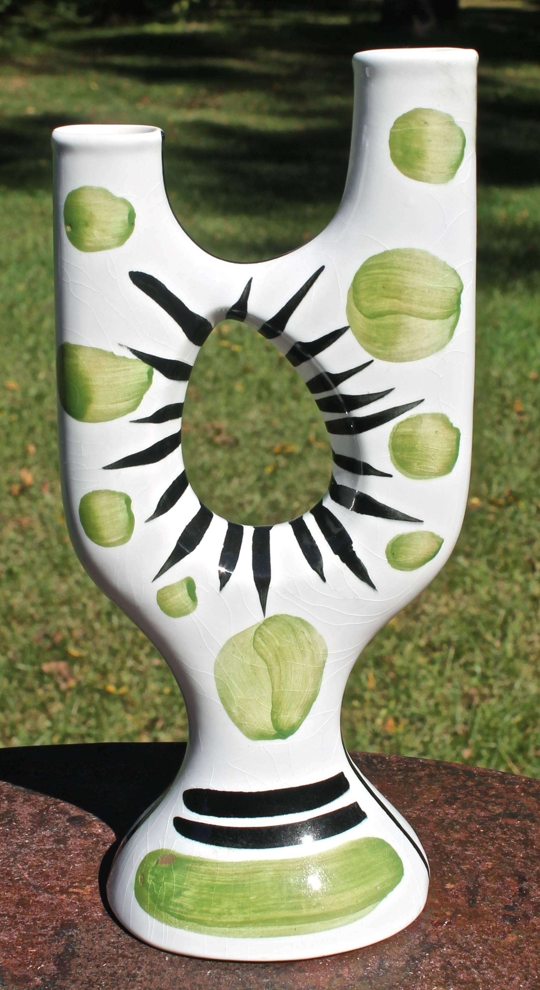 A beautiful and uniquely hand-painted French Mid-Century Modern vase.