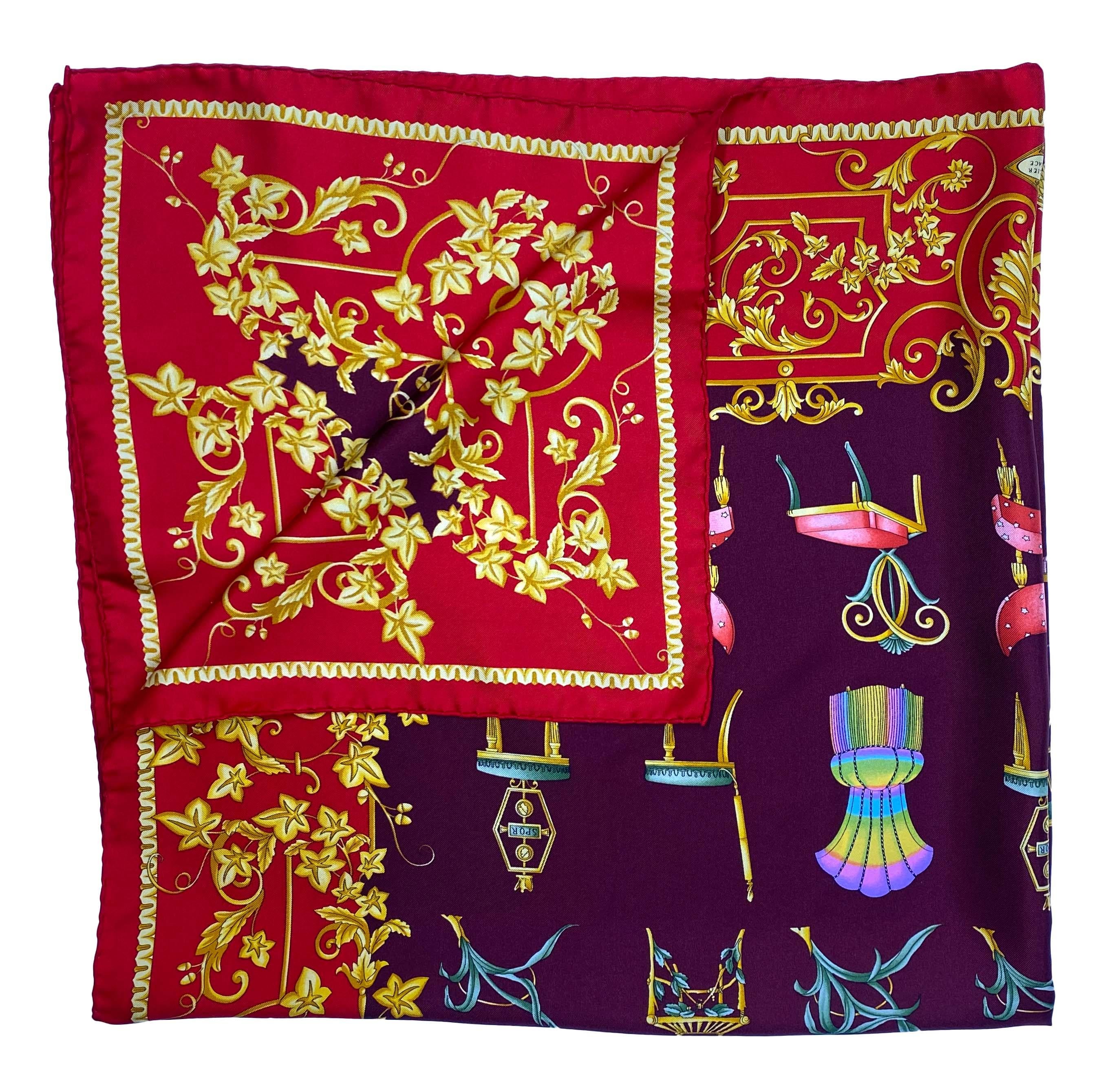 Presenting a beautiful baroque Atelier Versace square silk scarf, designed by Gianni Versace. This scarf features a number of chairs surrounded by a floral baroque pattern. A small Versace Medusa logo is situated opposite the Atelier Versace