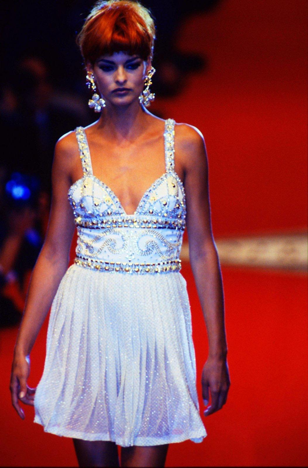 An extremely special & museum worthy piece, this exceptional dress dates to the F/W 1991 Atelier Versace (Haute Couture) collection dubbed 'Couture Gladiators'. Highly documented, it was worn by Linda Evangelista on the runway and by Christy