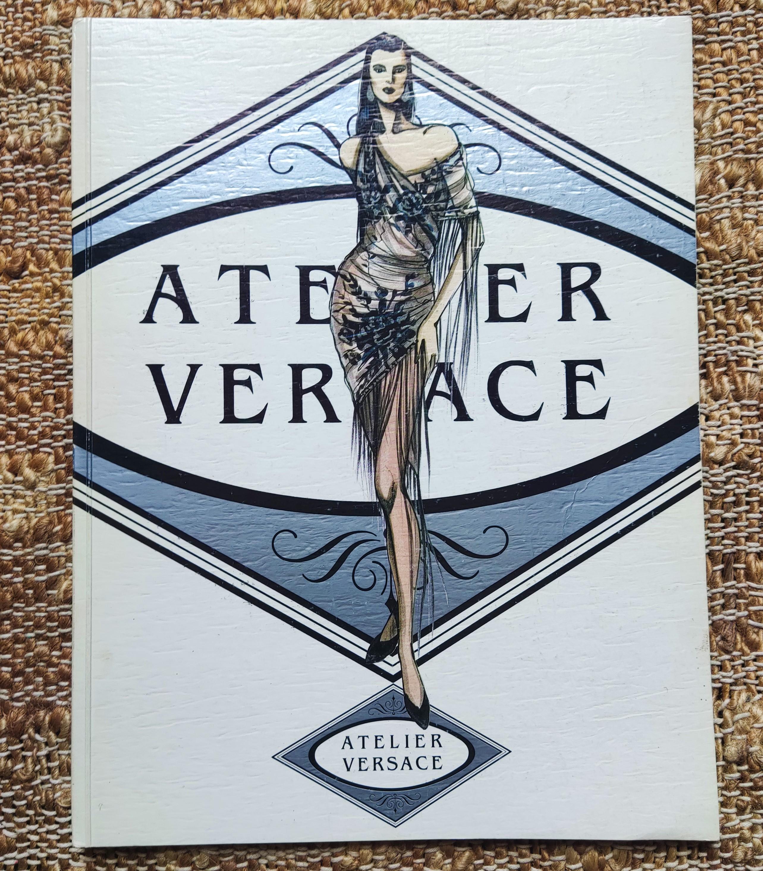 Atelier Versace catalog about the 1989-90 collection!

Wonderful illustrations such as:
Doctor Faustus
Elton John
David Bowie
Eric Clapton
Sting 
Cher
Chaka
Capriccio
The passion of Cleopatra
Swan Lake
Faye Dunaway
Artifact

VERY GOOD