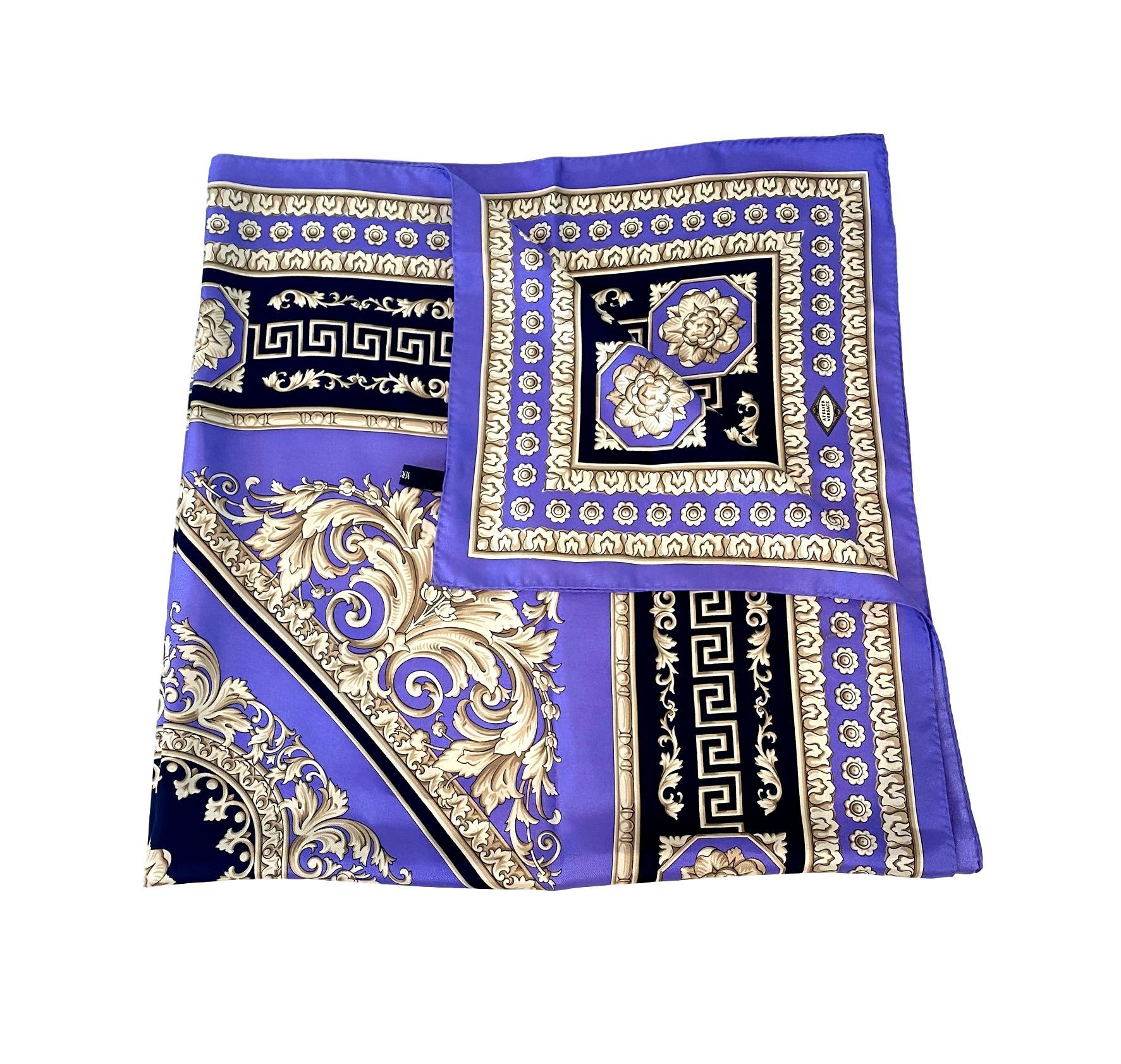Atelier Versace Purple and Black Floral Ganymede Print Silk Twill Scarf by Versace circa 1994. Established in 1978, Gianni Versace became well known world wide for his use of bold and bright prints inspired and designed around ancient Greek