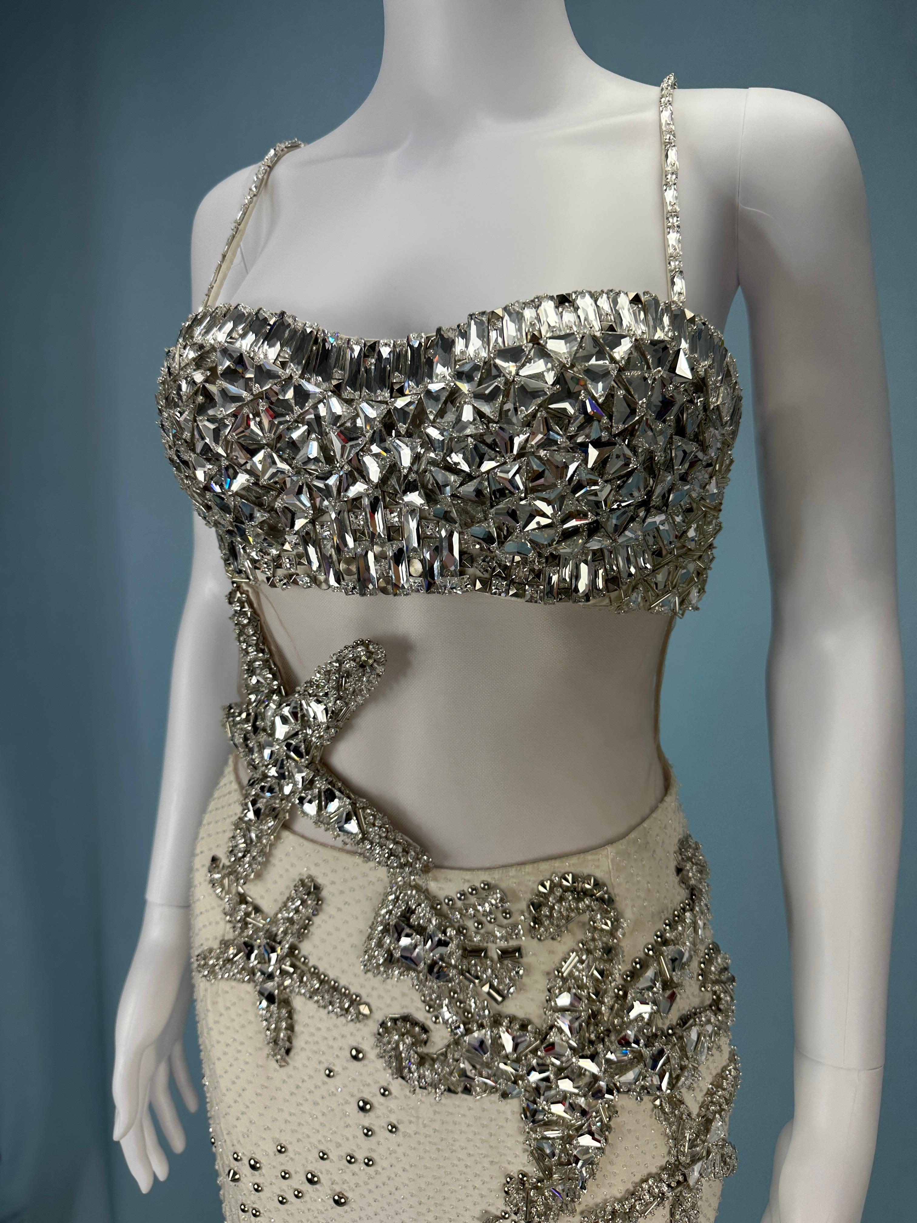 Atelier Versace - Versace’s haute couture made-to-order line 
Spring 2012 - closing look on the runway, and in editorial shoots

Crystal embellished white silk full length gown

Starfish and shell crystal details

Fully embellished bust 

Nude mesh