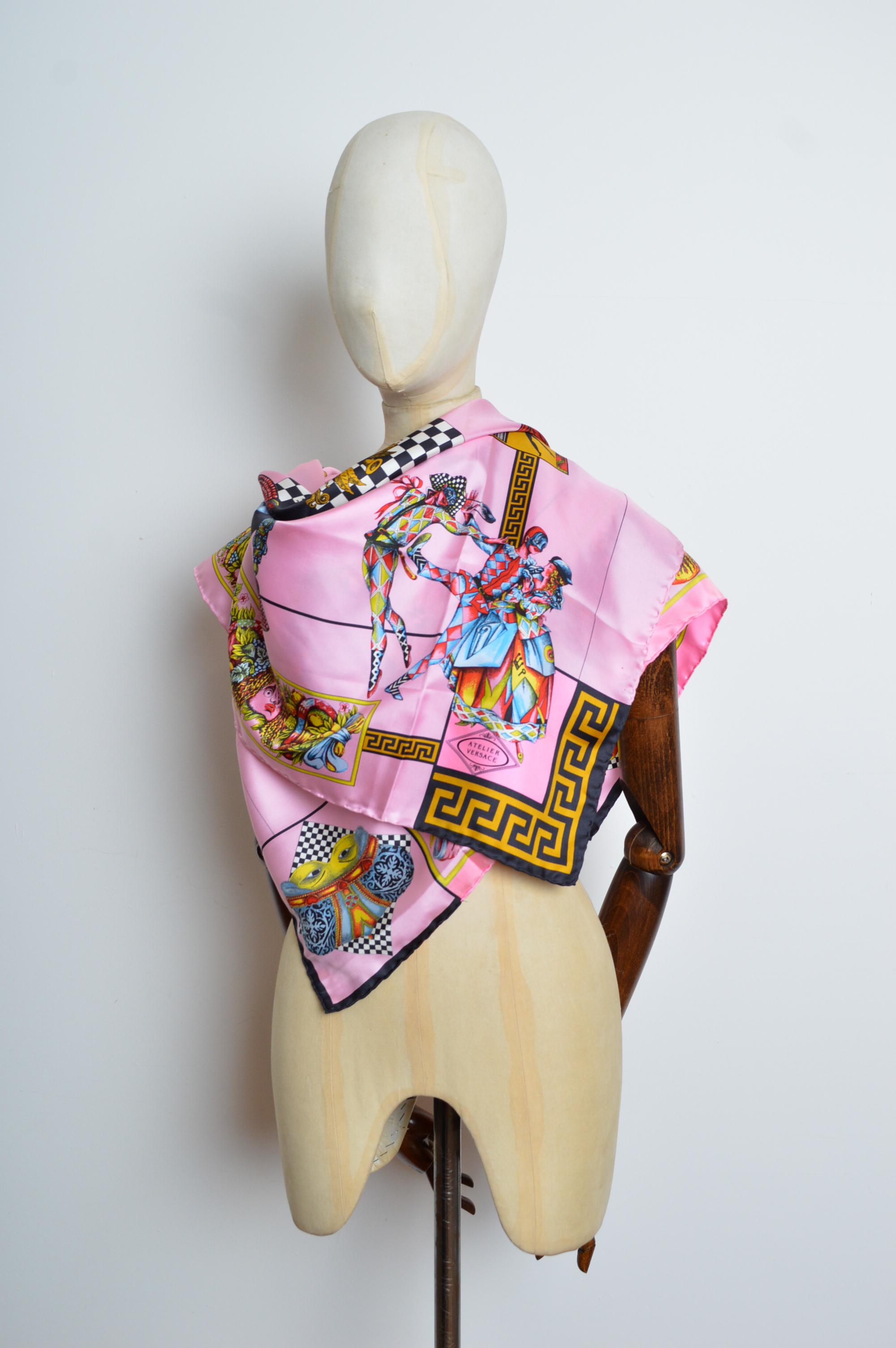 Superb Vibrant Pure silk foulard by Gianni Versace for the prestigious ‘Atelier Versace’ collection of 1992, depicting Italian Harlequins and Colourful theatrical scenes. 
MADE IN ITALY. 
Size; ONE SIZE
Measurements are provided in inches