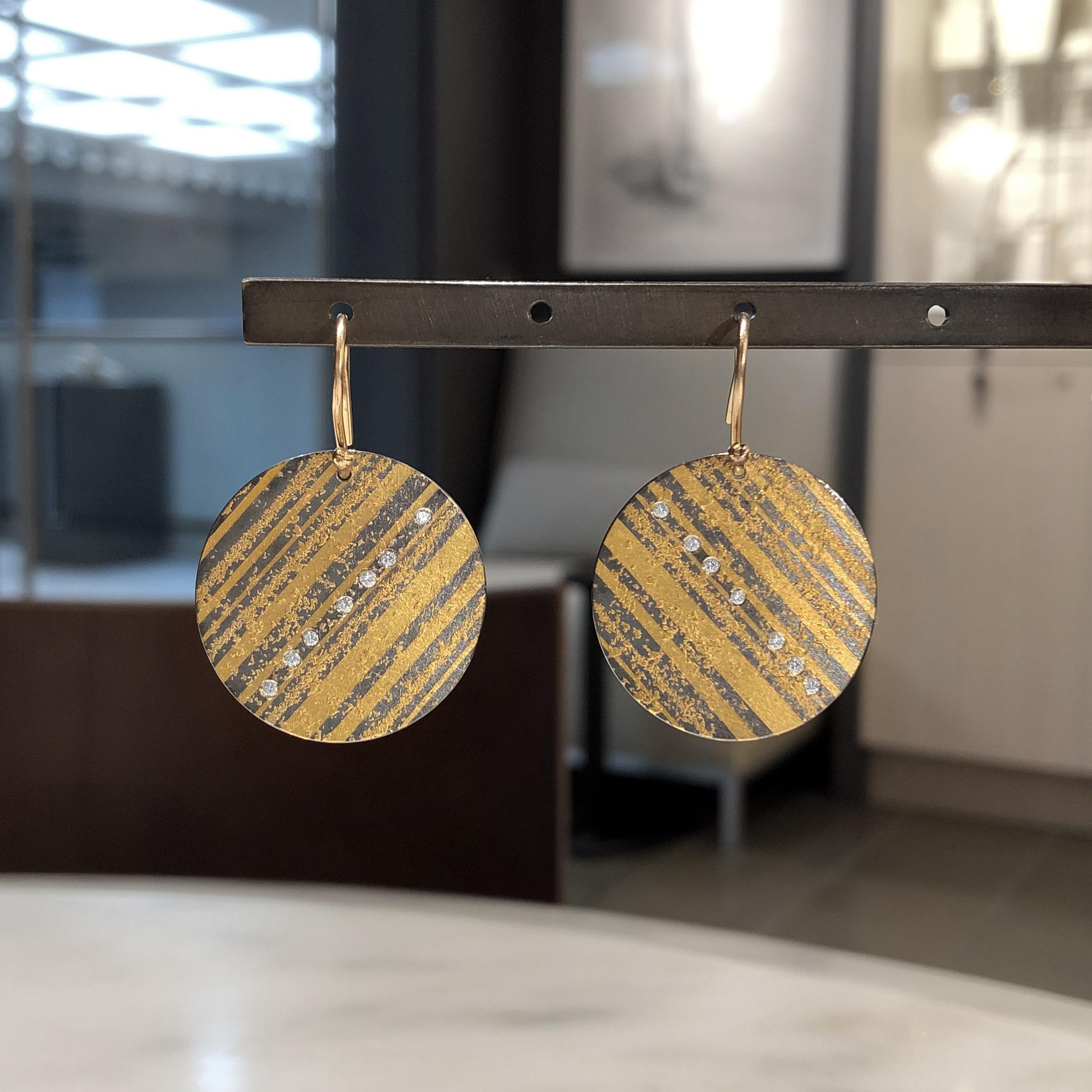 One of a Kind Curved Disc Drop Earrings hand-fabricated in 2019 in Germany by award-winning jewelry maker Atelier Zobel (Peter Schmid) in 24k and 18k yellow gold and oxidized sterling silver with fourteen round brilliant-cut diamonds totaling 0.14