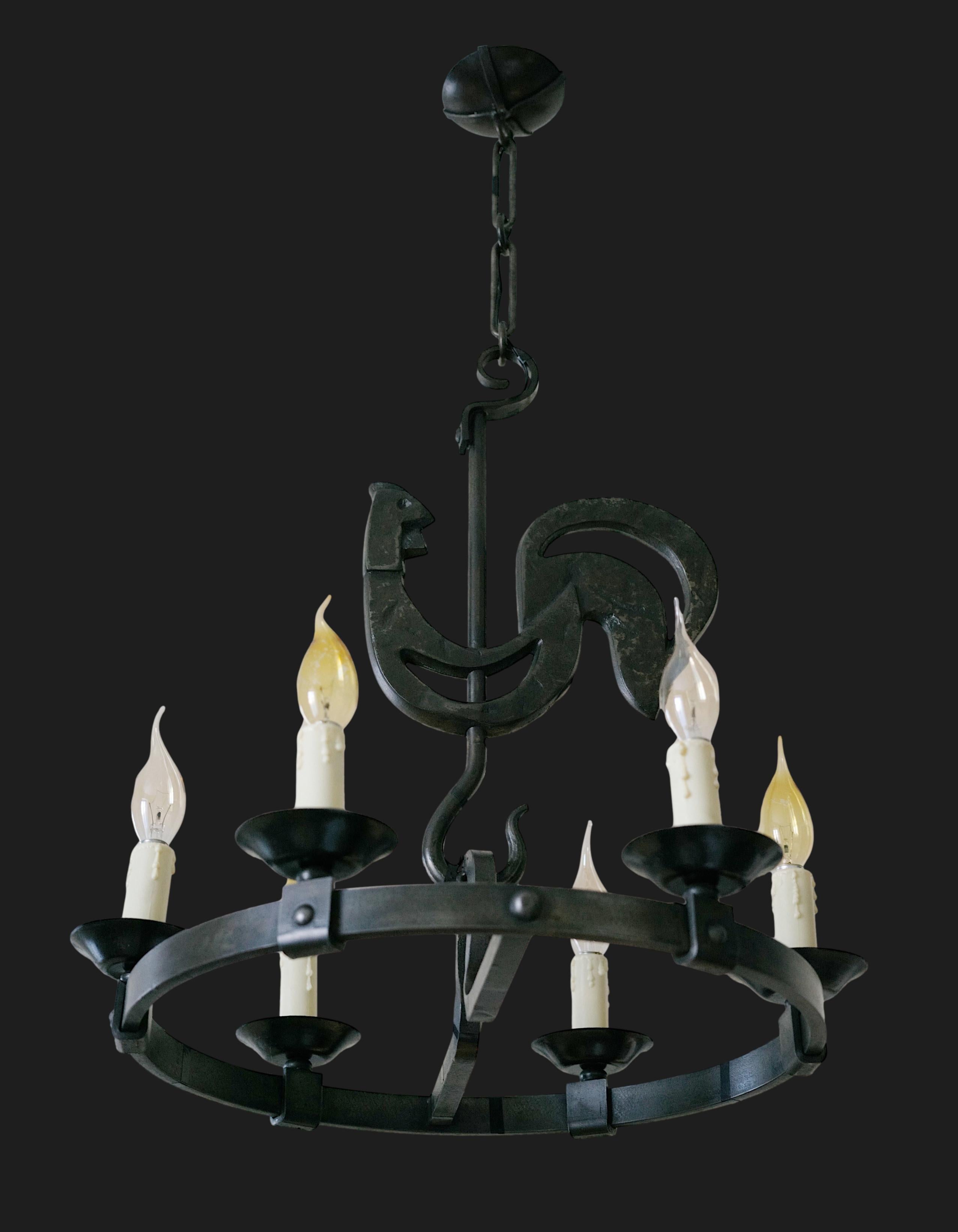 French Midcentury chandelier by Ateliers de Marolles, created by Jean TOURET,  artistic director and Henri VION, ironworker, France, ca.1950. Gothic chandelier with rooster singing pattern. Wrought-iron. Height : 35.5