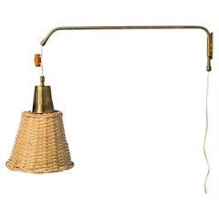 Ateljé Lyktan, Articulating Wall Light, Brass, Cane, Teak, Sweden, 1970s