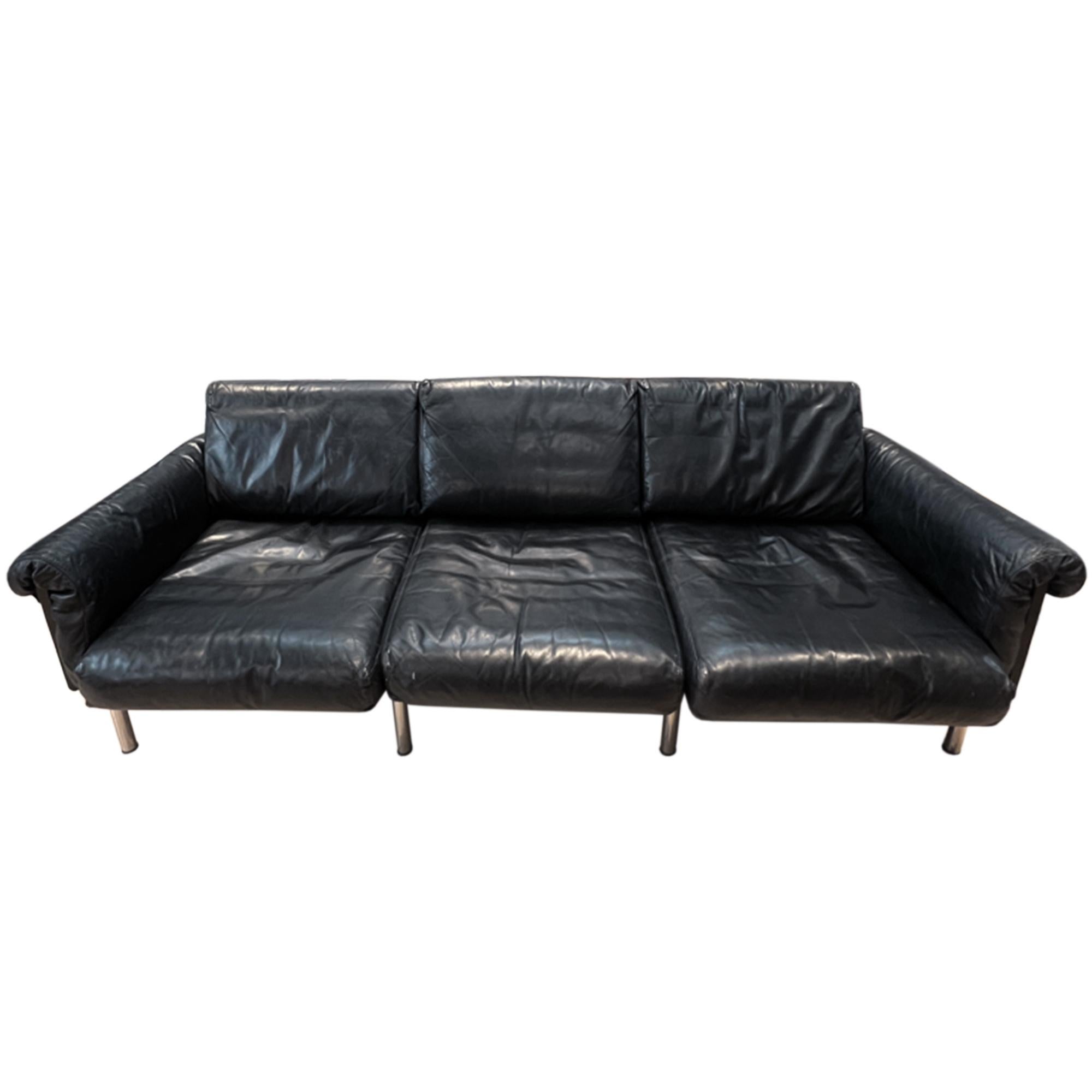 A fabulous black vintage Ateljee leather sofa, this piece was designed by Yrjo Kukkapuro and was made in Finland in 1963. 

Crafted from beautiful black leather, ebonized wood and chromed metal legs.

We've had the leather fully restored and