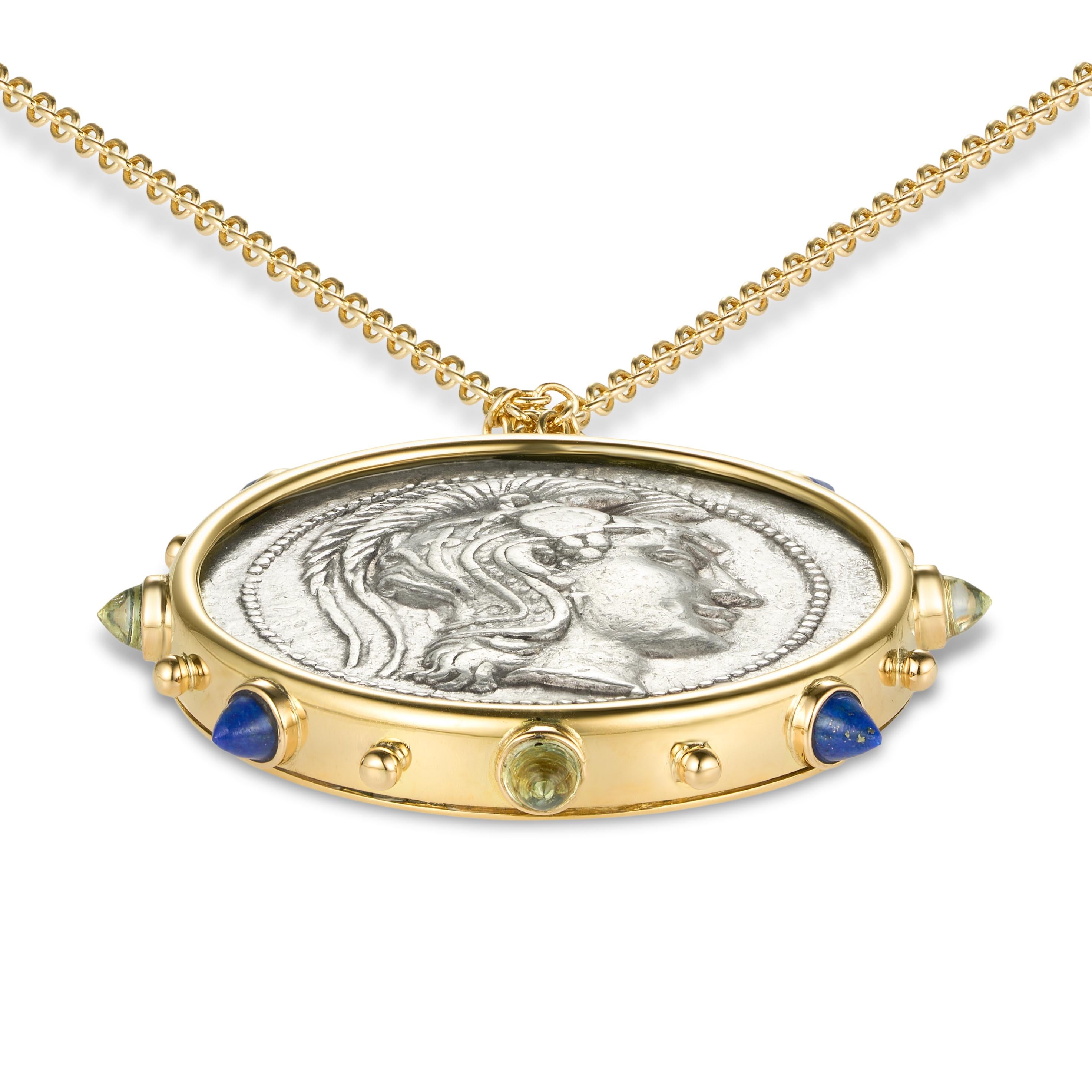 *RARE* This exquisite necklace showcases an authentic AR tetradrachm coin of Athena, dating back to circa 136/5 B.C., set in 18kt yellow gold. The coin is adorned with lapis and topaz cabochons.

COIN DETAILS:

- Origin: ATTICA, Athens.
- Period: