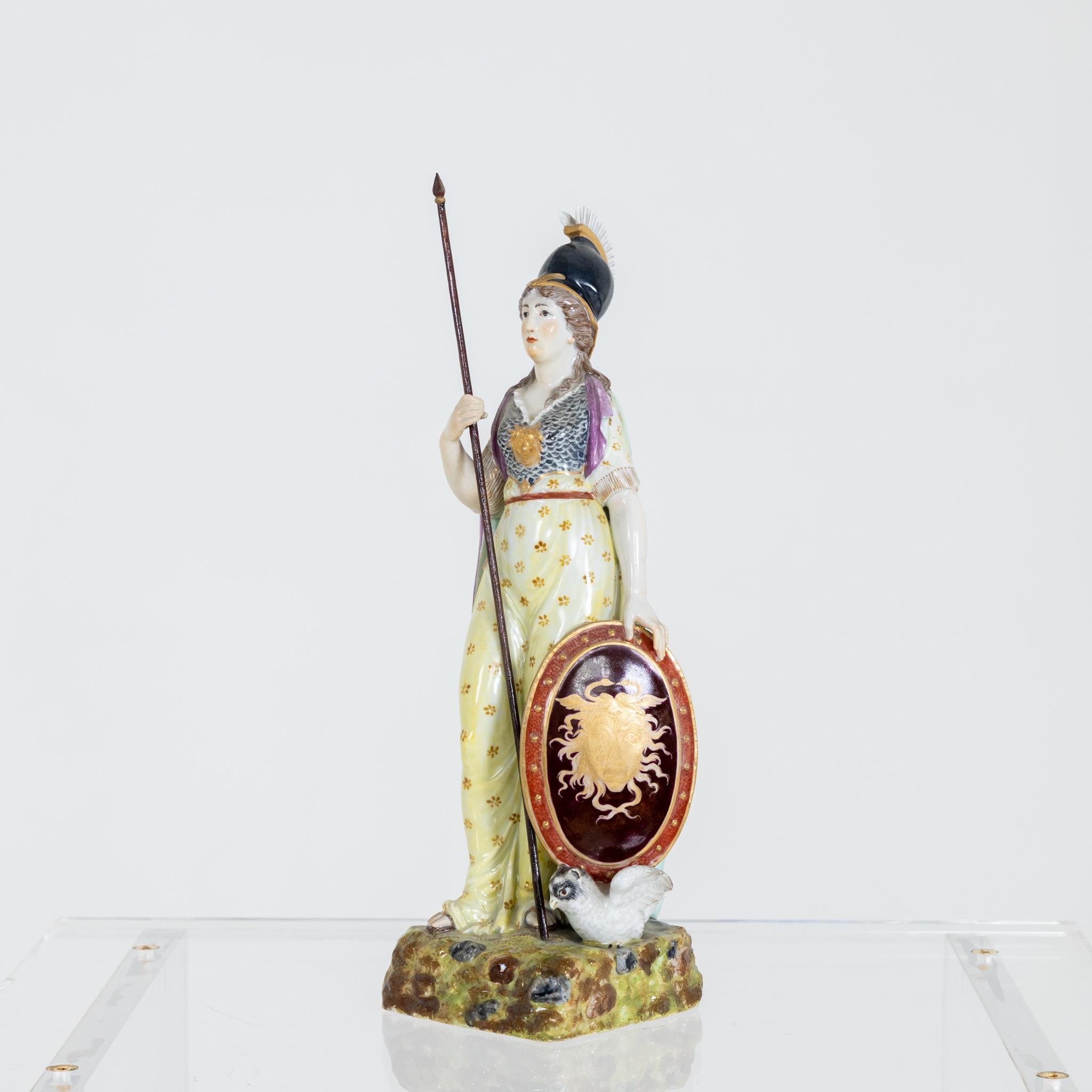 Polychrome painted porcelain figure of Pallas Athena with owl and Gorgon shield.