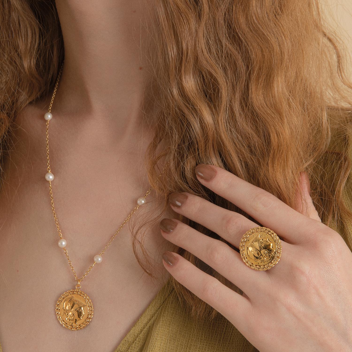 'But my heart breaks for Odysseus, that seasoned veteran cursed by fate so long, far from his loved ones still, he suffers torments.'

The 'Athena' medallion by Vintouch Jewels is cast from 24 karat gold vermeil with an antique coin depicting Greek