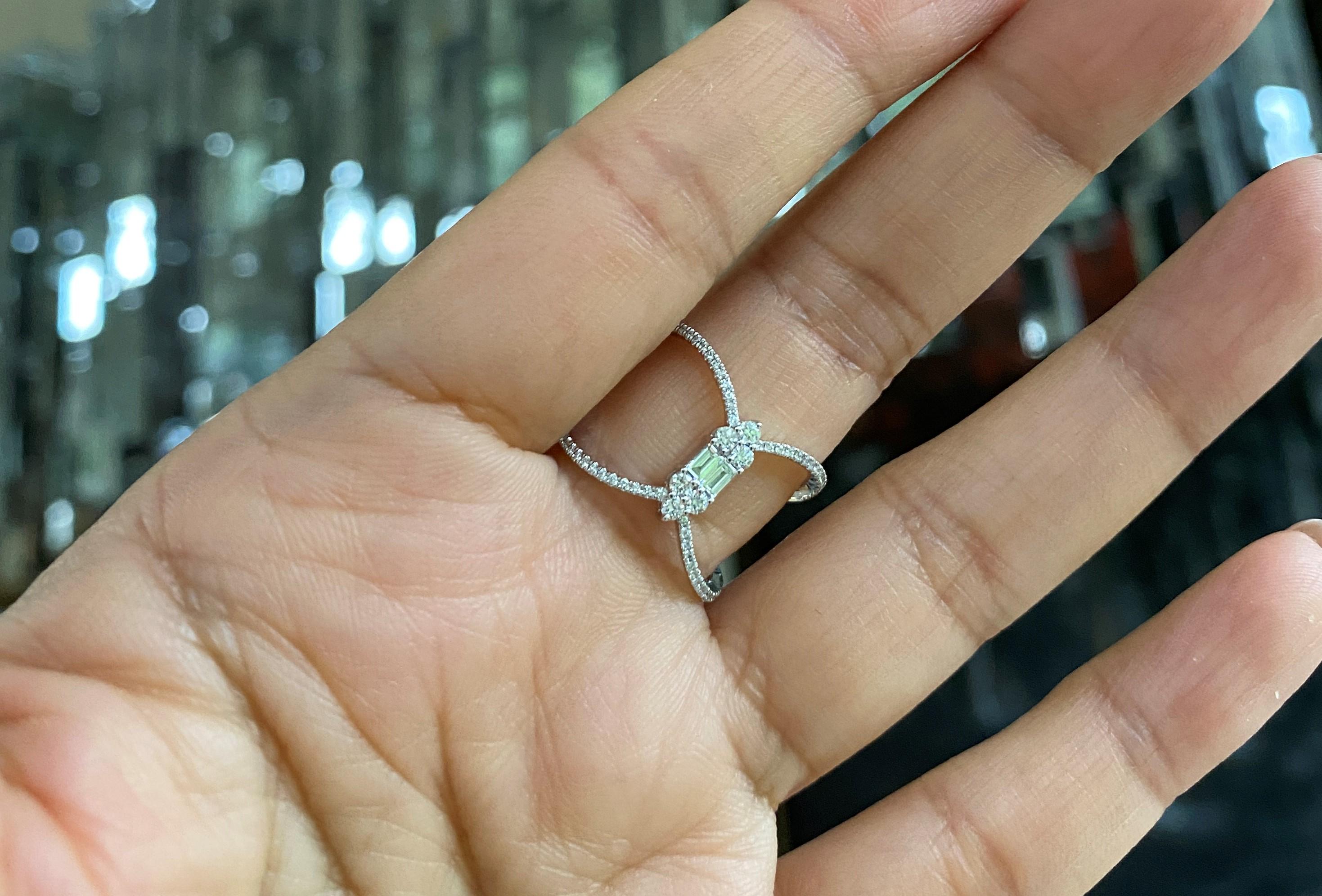 Make a statement with this exquisite ring with pave brilliant cut diamonds and generously sized white diamond baguettes. Dress up or down, wear it as a cocktail ring or alternative bridal band or engagement ring.  