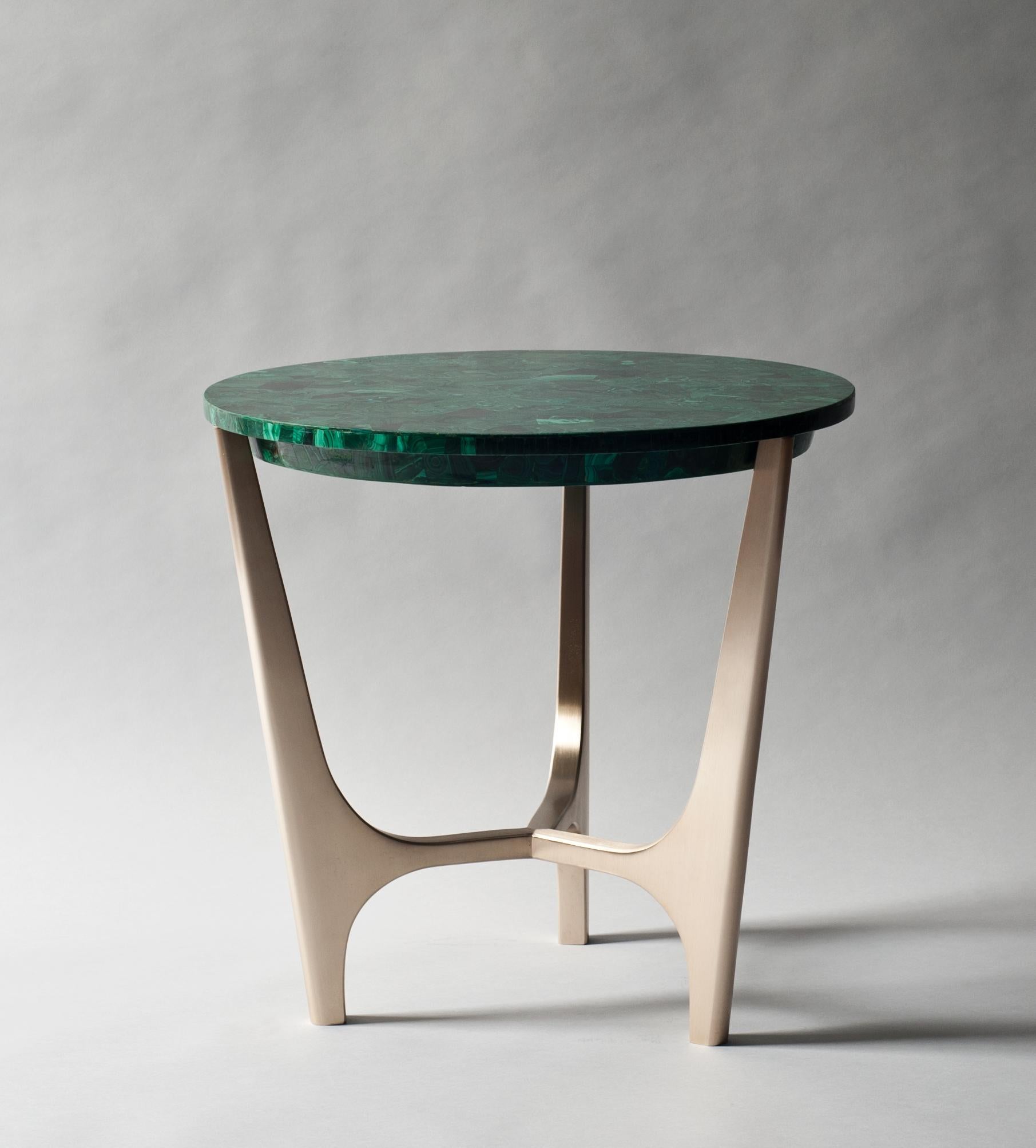 Athena side table by DeMuro Das 
Dimensions: 57 x H 55.2 cm
Materials: Malachite - Polished (Random) tabletop
 Solid bronze - Satin legs 

Dimensions and finishes can be customized

DeMuro Das is an international design firm and the aesthetic