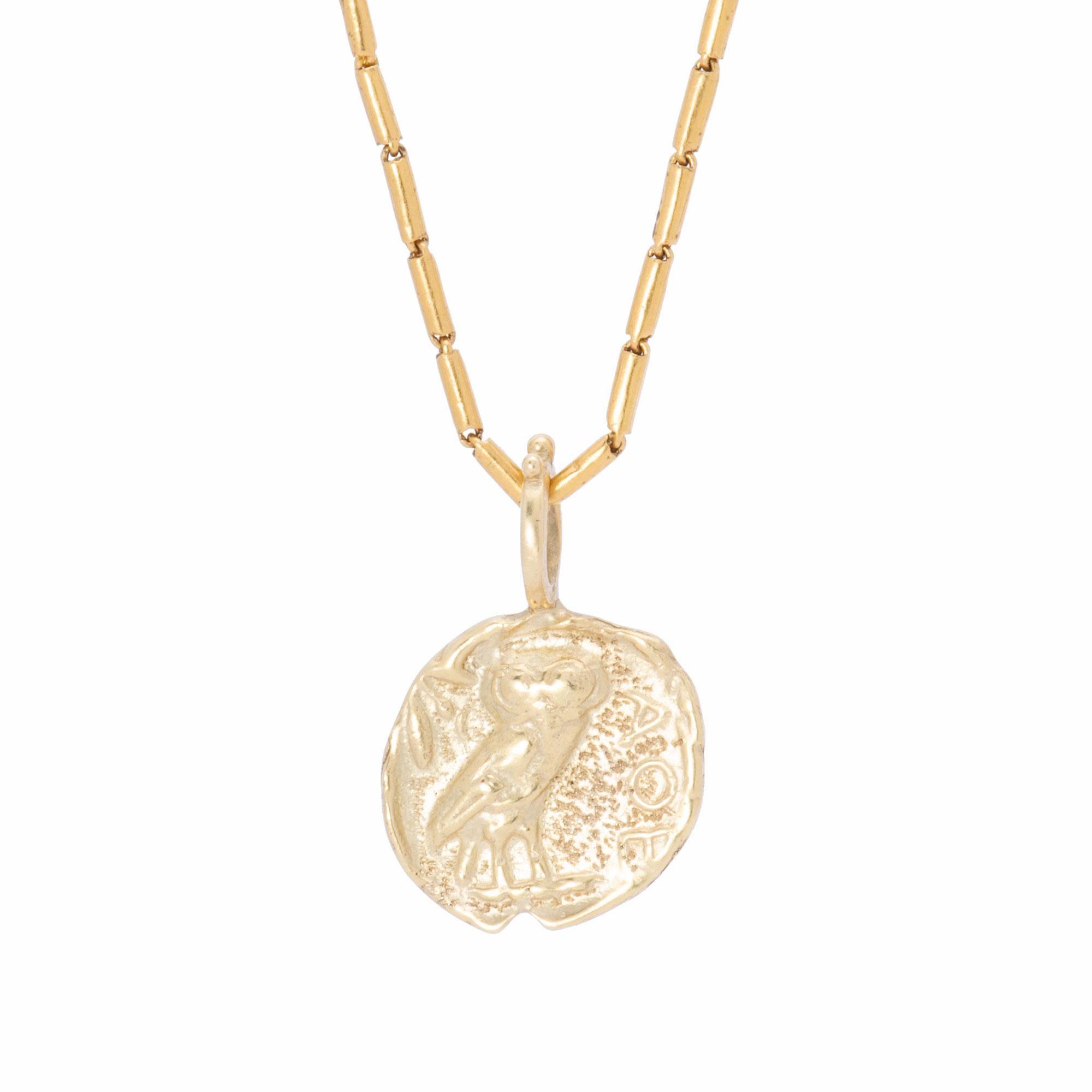 From Athena, Goddess of Wisdom, comes the 18k gold reproduction coin pendant bearing her animal totem, the owl. Athena's Owl Pendant in 18 karat gold is hand crafted in our studio with our signature satin finish. Perched in 3/4 profile, the owl