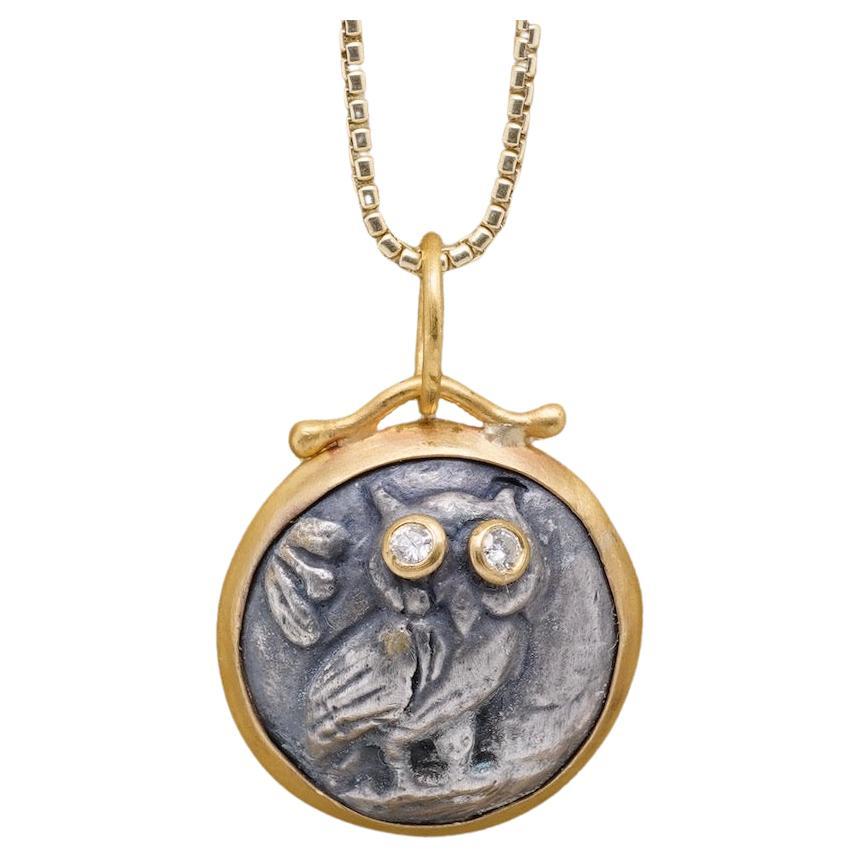 Athena's Owl with Diamond Eyes, Coin Charm Amulet Pendant Necklace, 24kt Gold and Silver by Prehistoric Works of Istanbul, Turkey. Diamond - 0.04cts. These coin amulets pair well alone or with other coin pendants or with miniature pendants. Measures