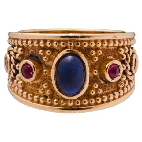 For Sale:  Athenas Ring in 18k Gold with Centered Sapphire, Rubies & Diamonds