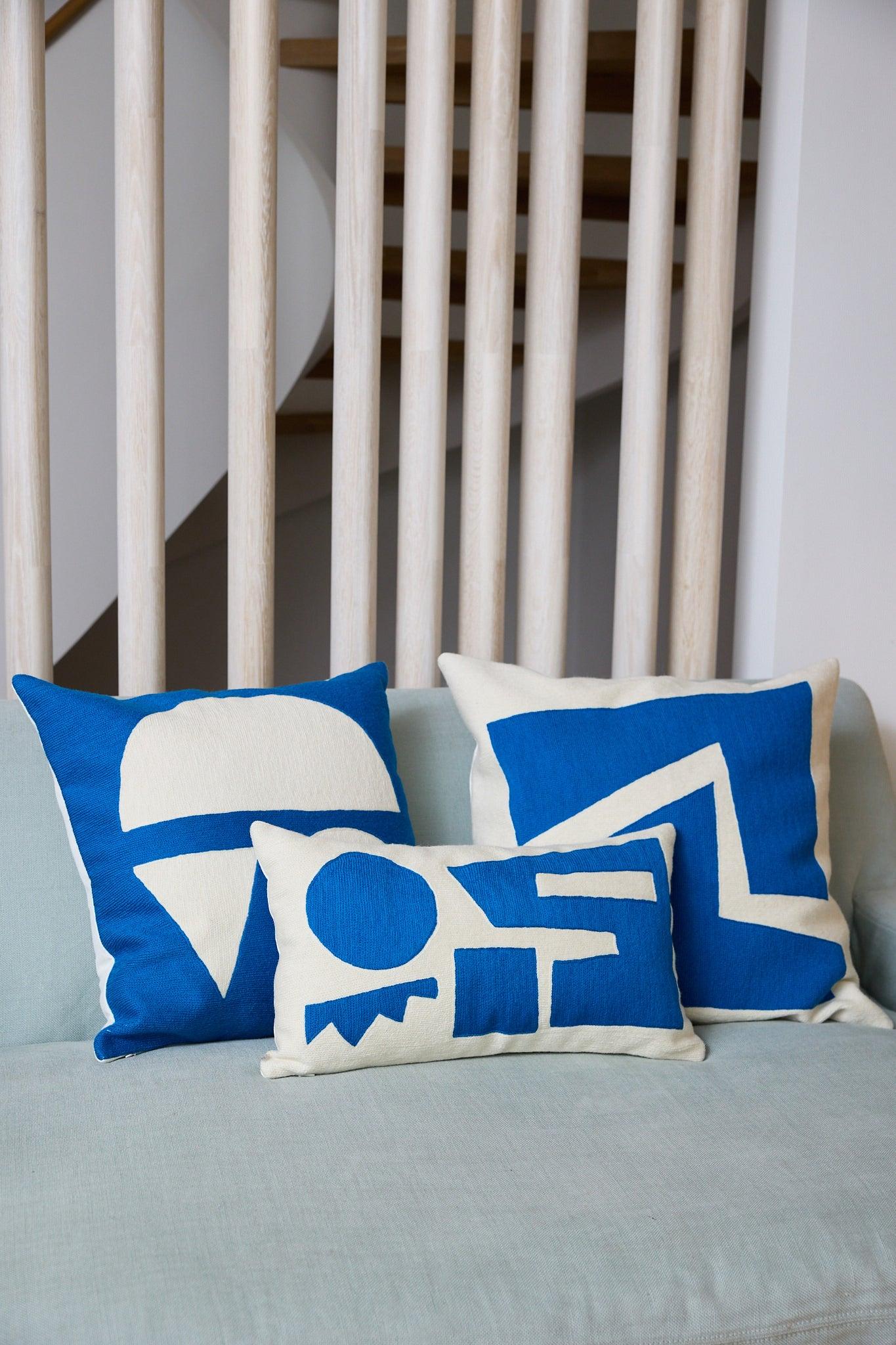These geometric throw pillows have been ethically hand embroidered by artisans in Kashmir, India, using a traditional embroidery technique which is native to this region.

The purchase of this handcrafted pillow helps to support the artisans and