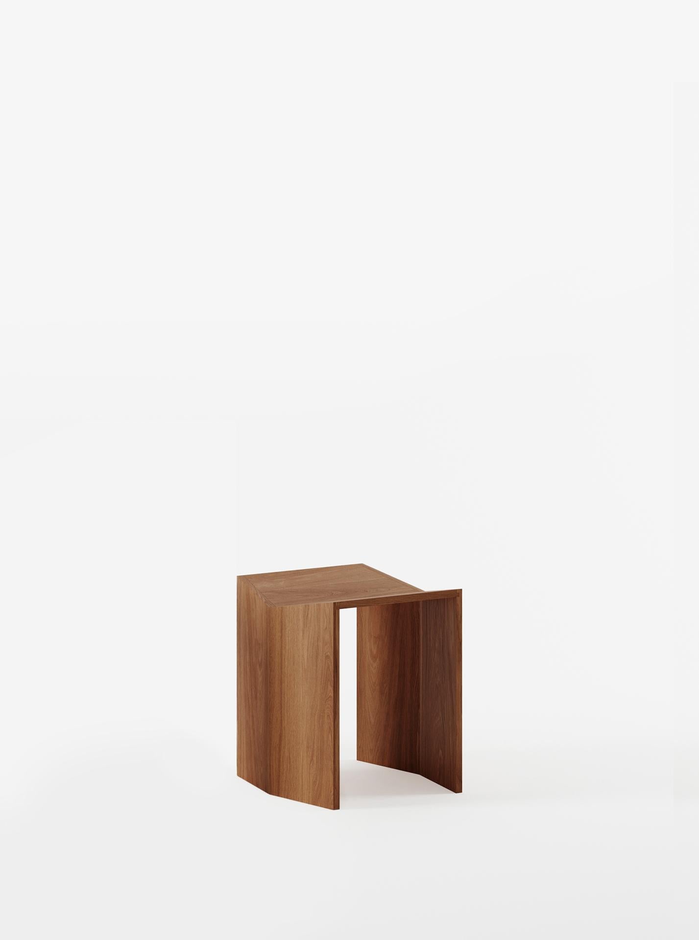 Inspired by classical Greek architecture, the Athens stool uses only two different elements. Made of solid wood, the geometry of the stool comes as a result of its assembly method - three simple 'folds' of the same angle. Put together using a groove