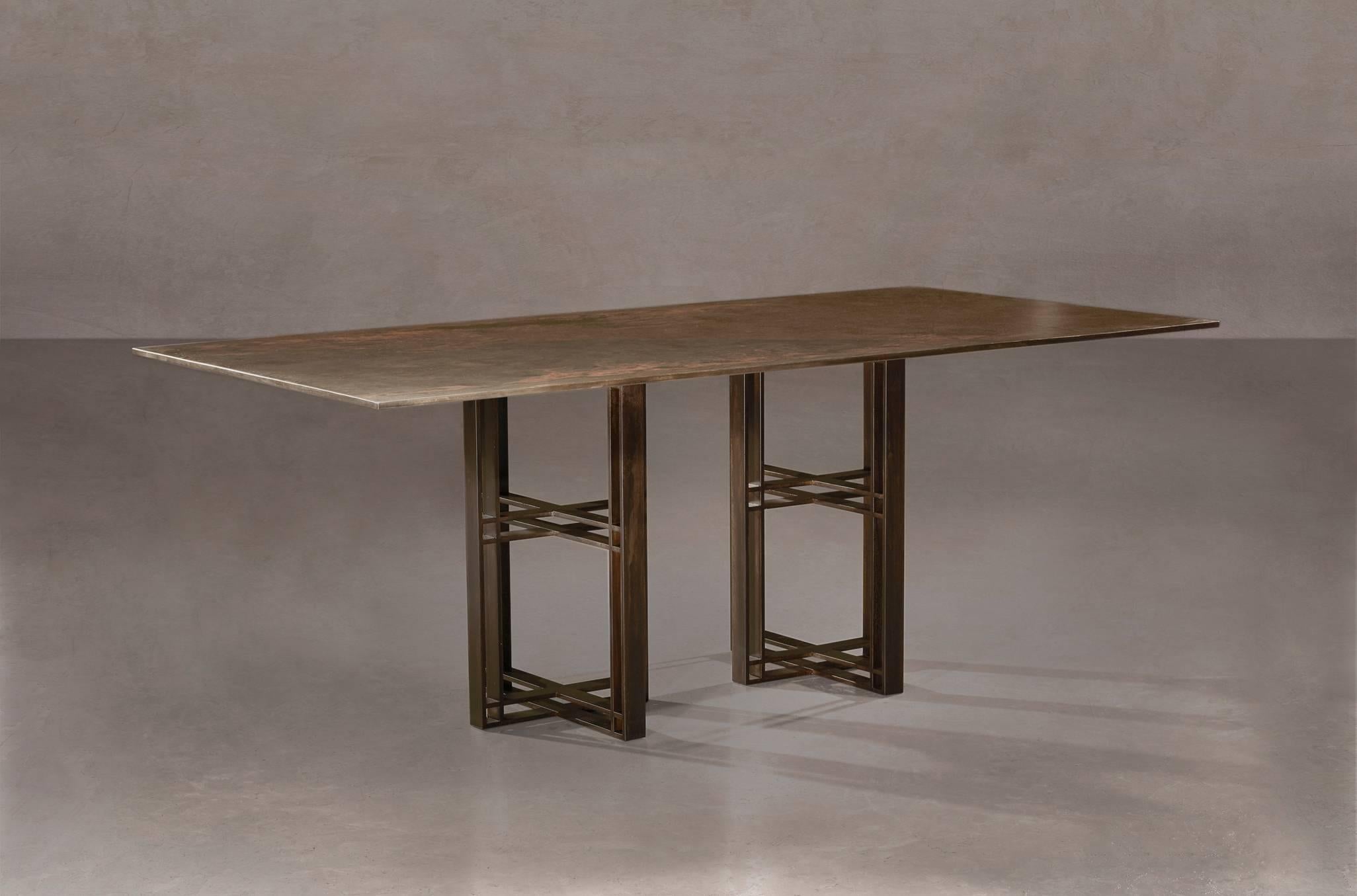 A dining table in patinated steel. Hand crafted in the North to order. Custom sizes and finishes are available.

Measures: 230 cm (width) x 75 cm (height) x 110 cm (depth).
Custom sizes available. Available with marble or timber top.

Made to order