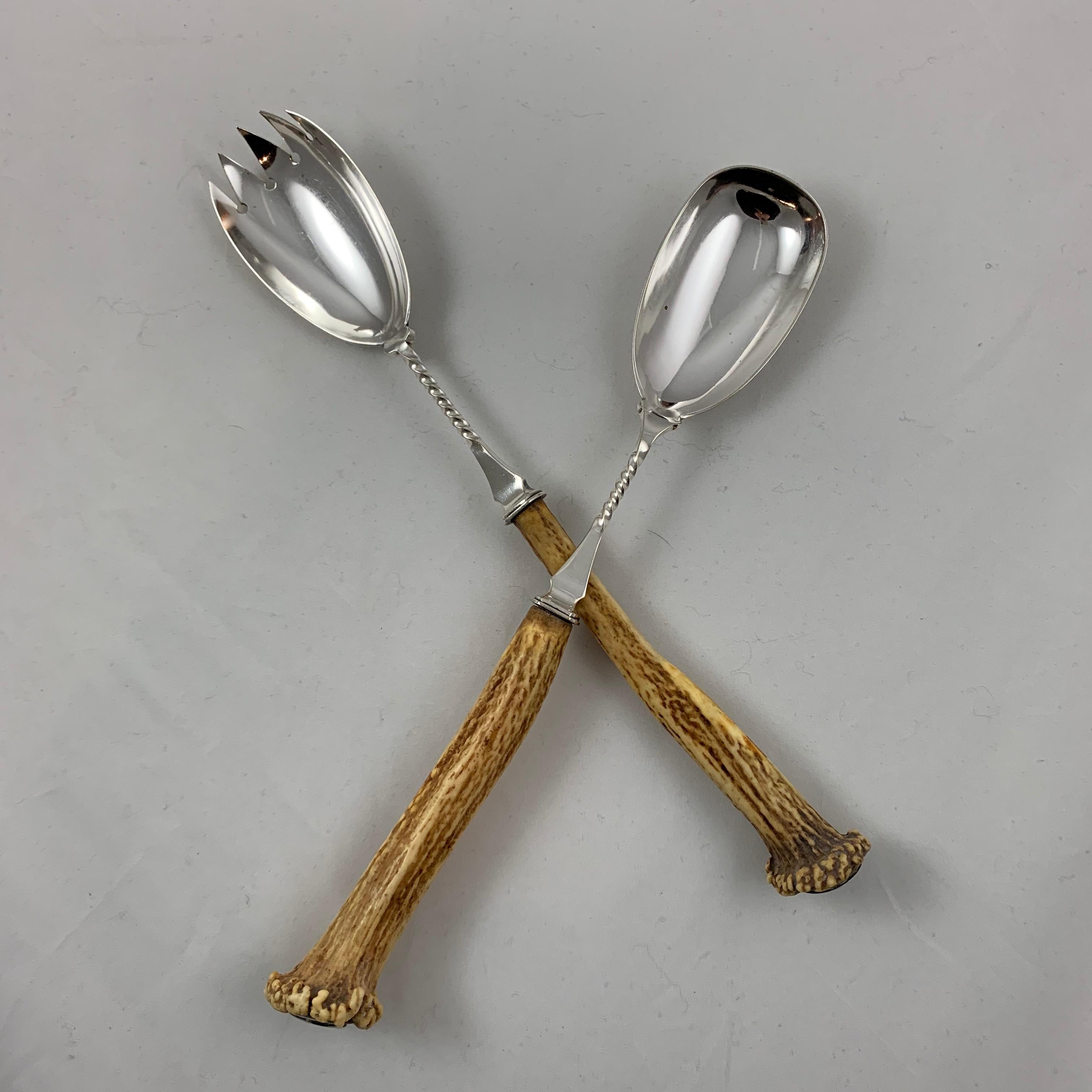 A set of salad servers, silver plate with natural Roe Buck antler handles, Atkin Brothers Silversmiths, Sheffield, England, circa 1878.

Beautifully made, a five-tined fork and shapely spoon with twisted stems, securely fixed to the antler