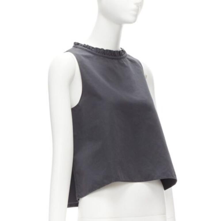 ATLANTIQUE ASCOLI charcoal grey ruffle collar dipped back boxy top US2 S
Reference: LNKO/A02233
Brand: Atlantique Ascoli
Material: Cotton, Linen
Color: Grey
Pattern: Solid
Closure: Pullover
Extra Details: Washed cotton. Ruffled dipped back collar